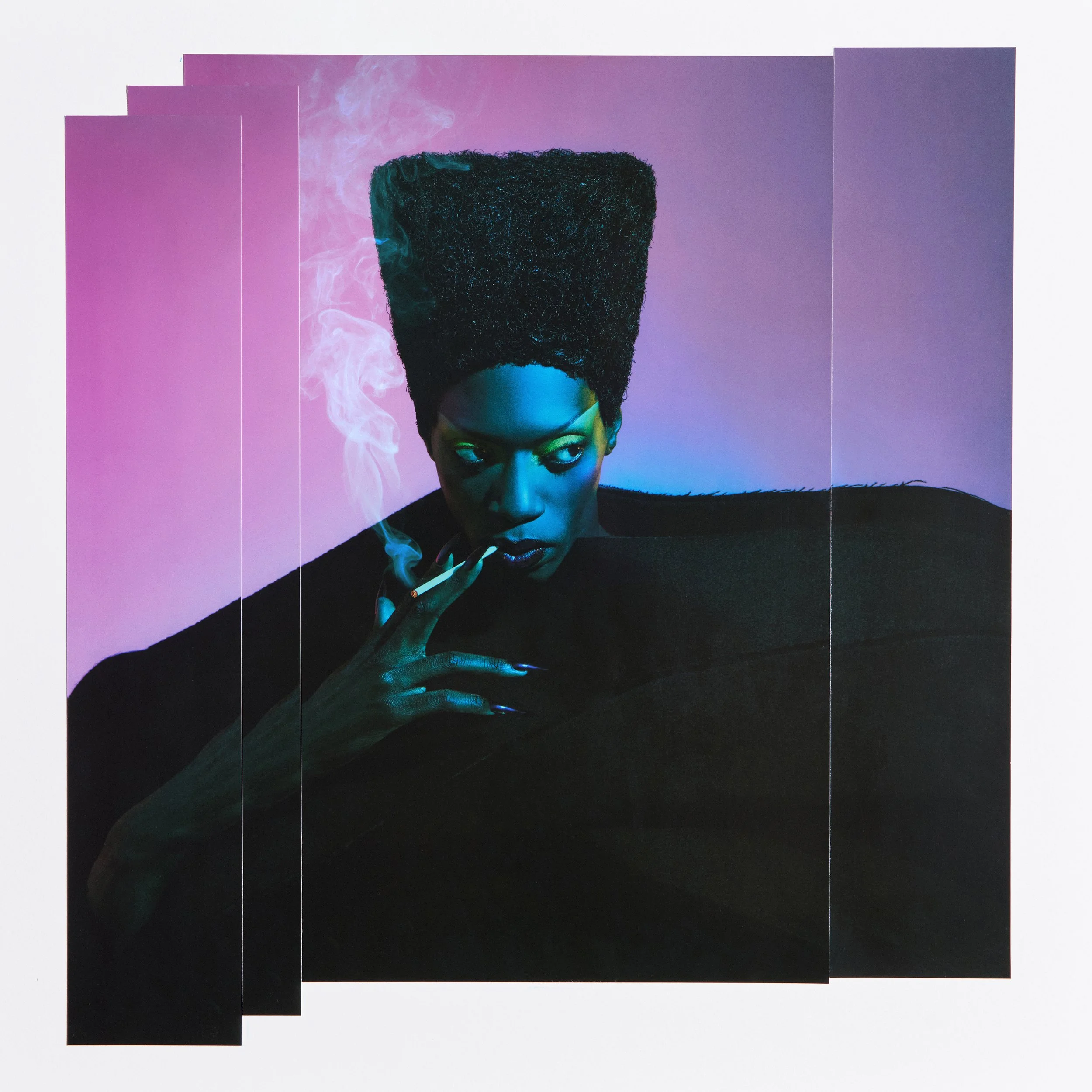Black Peppa as grace jones smoking. Wearing mason d tomsett
