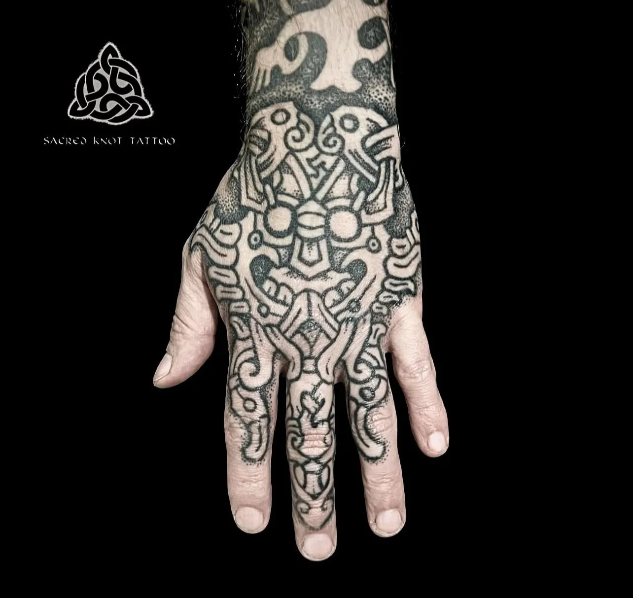 Sean+hand+tattoo+black+background.jpg