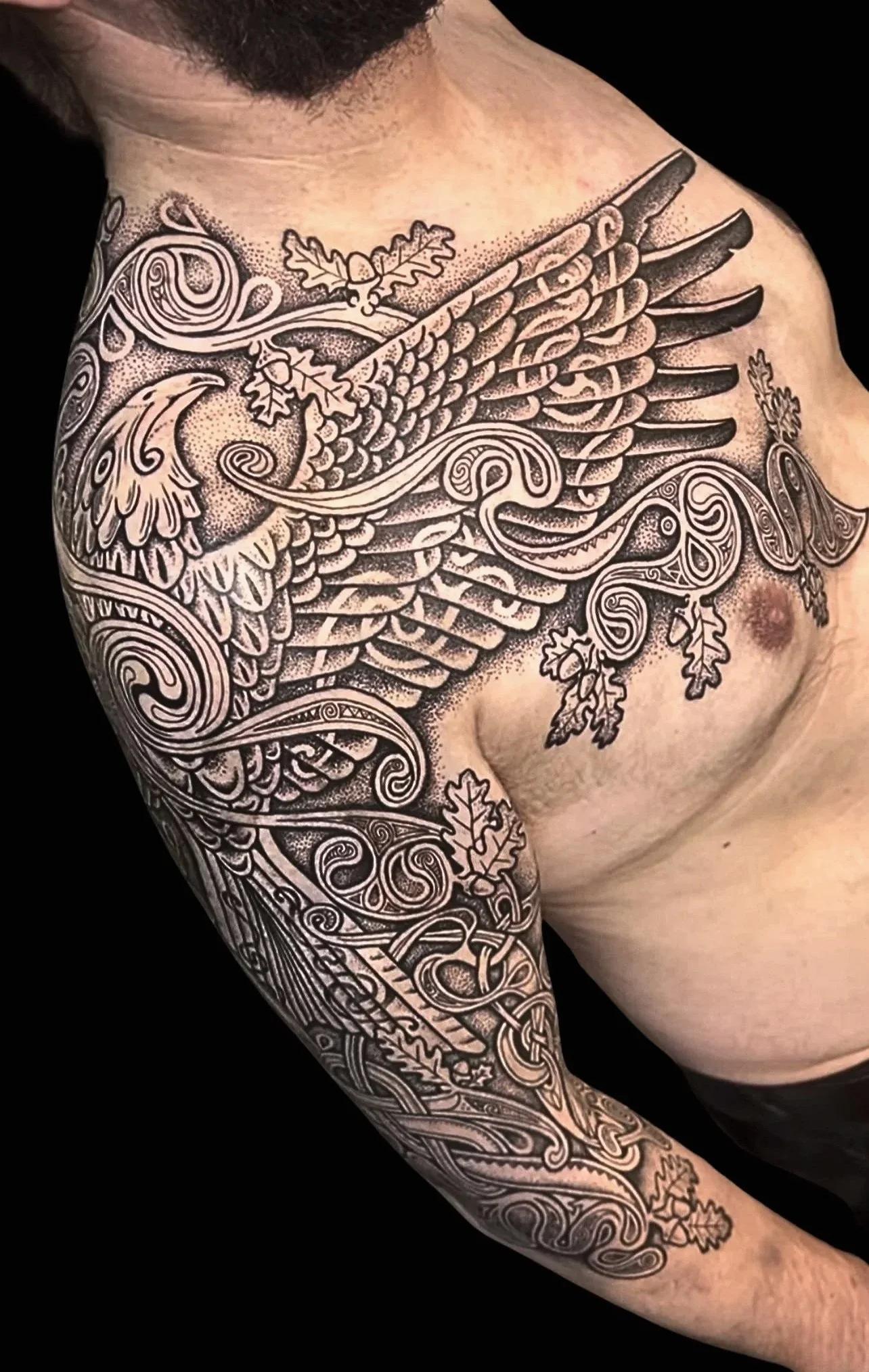 Sean+bird+tattoo+la+tene+elements+shoulder+and+chest+black+background.jpg