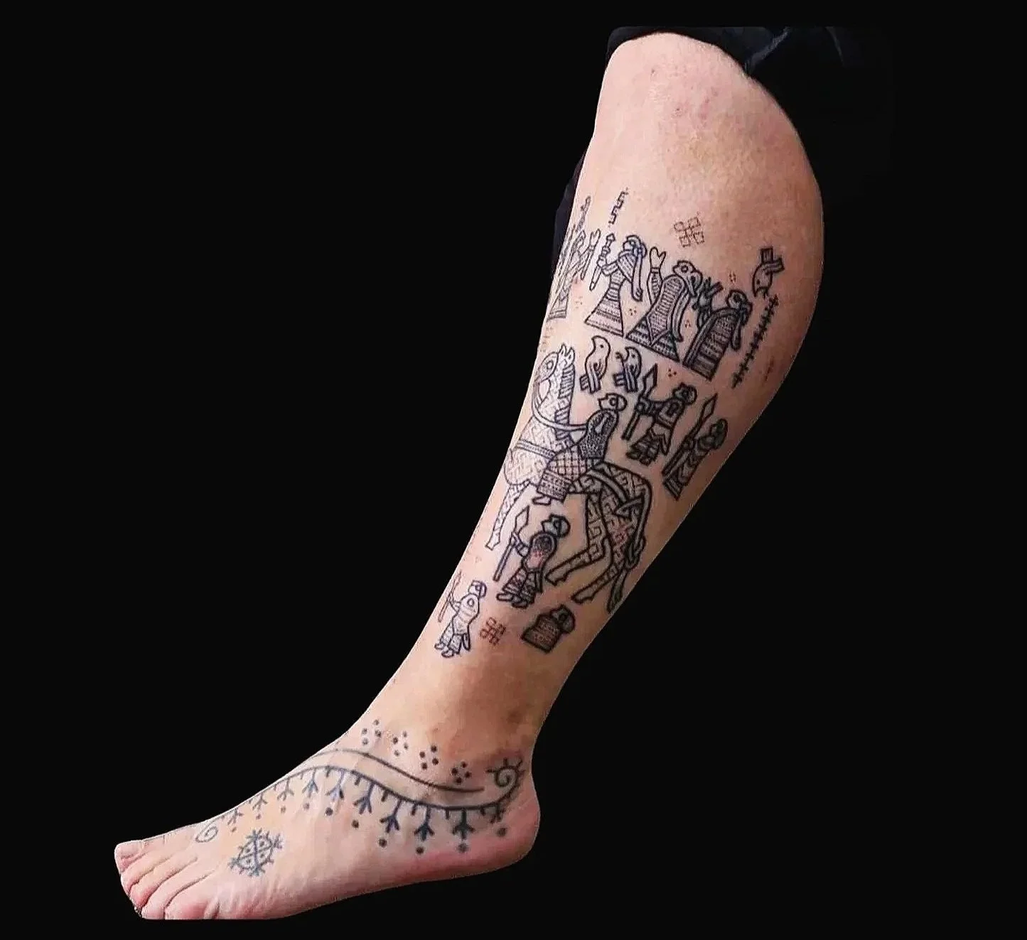 Sean%2BParry%2BOseberg%2BLeg%2Btattoo%2Bblack%2Bbackground.jpg