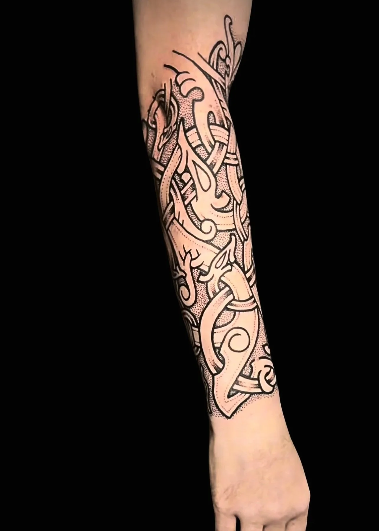Sean+Urnes+forearm+piece+black+background.jpg