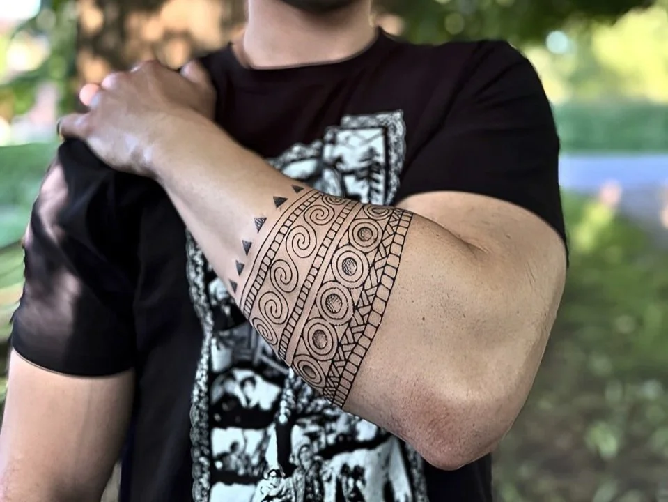 Neo Nordic Bronze Age arm band tattoo. Hand drawn design, Bronze Age inspired design, forearm band tattoo, sacred art, ancient art, black ink