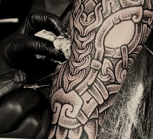 Villkat Arts Tattooing a Nordic Beast on a Forearm