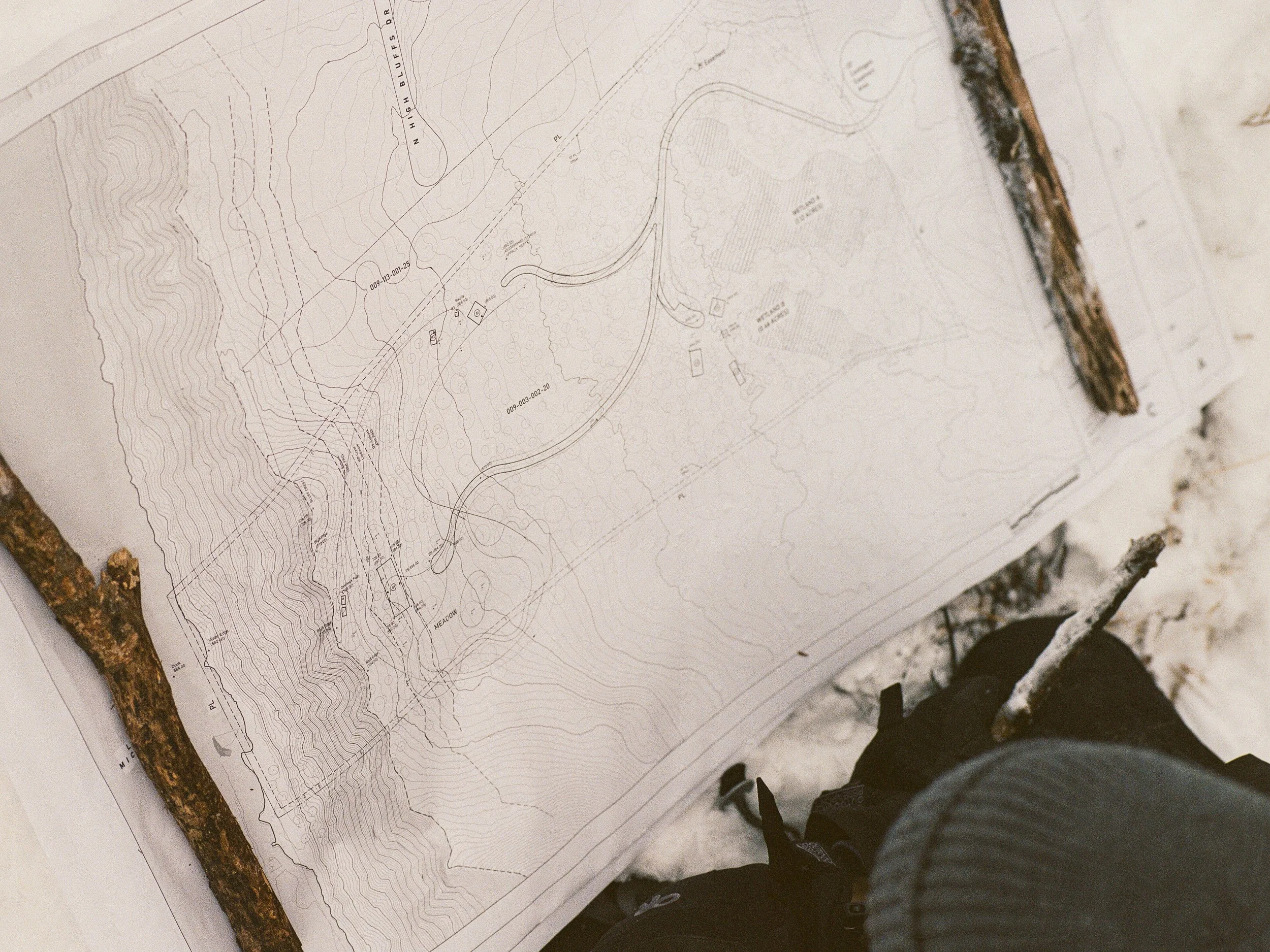  Architect viewing drawings in snow. 