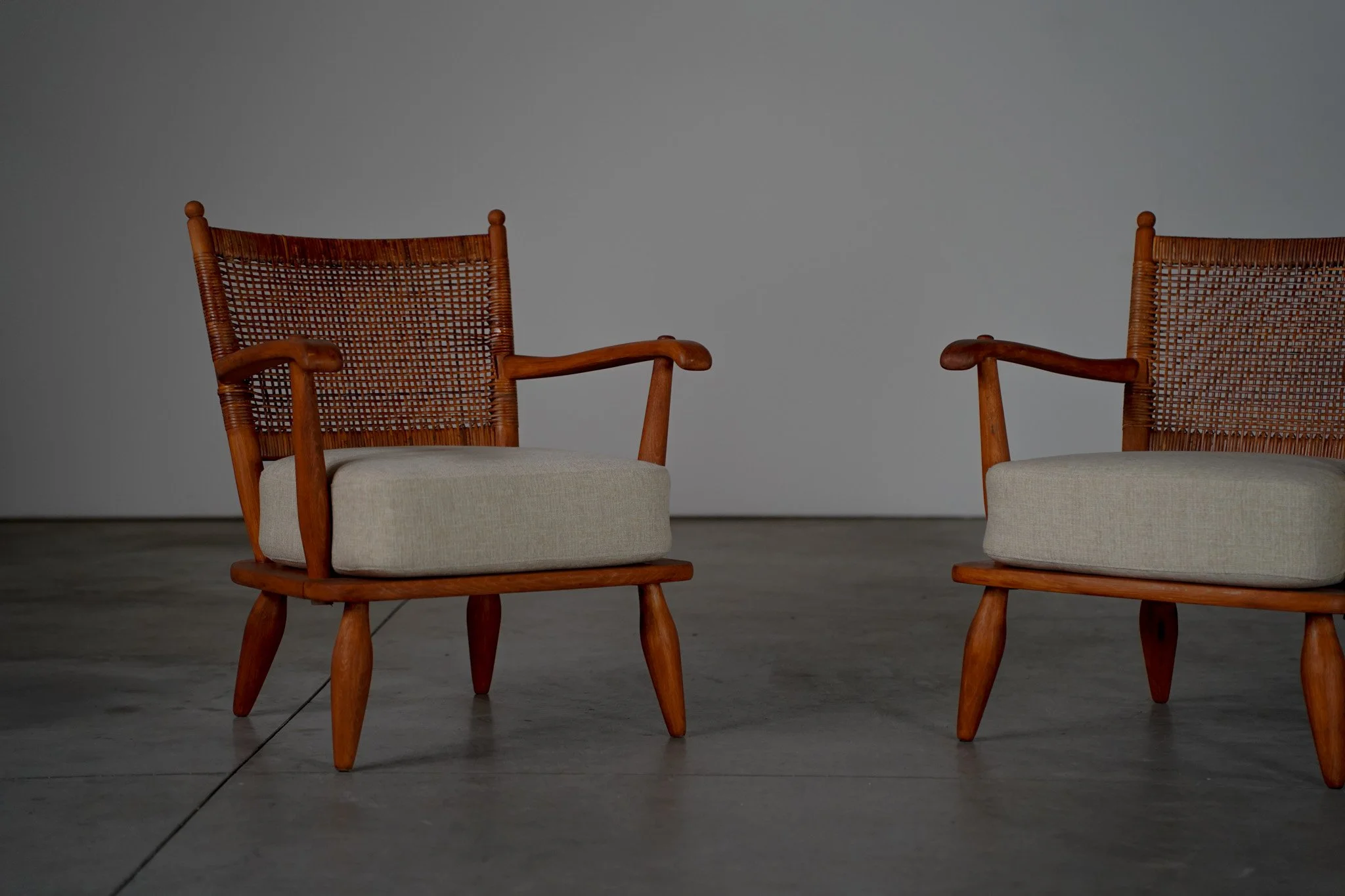 Pair of Lounge Chairs with Rattan Backrest