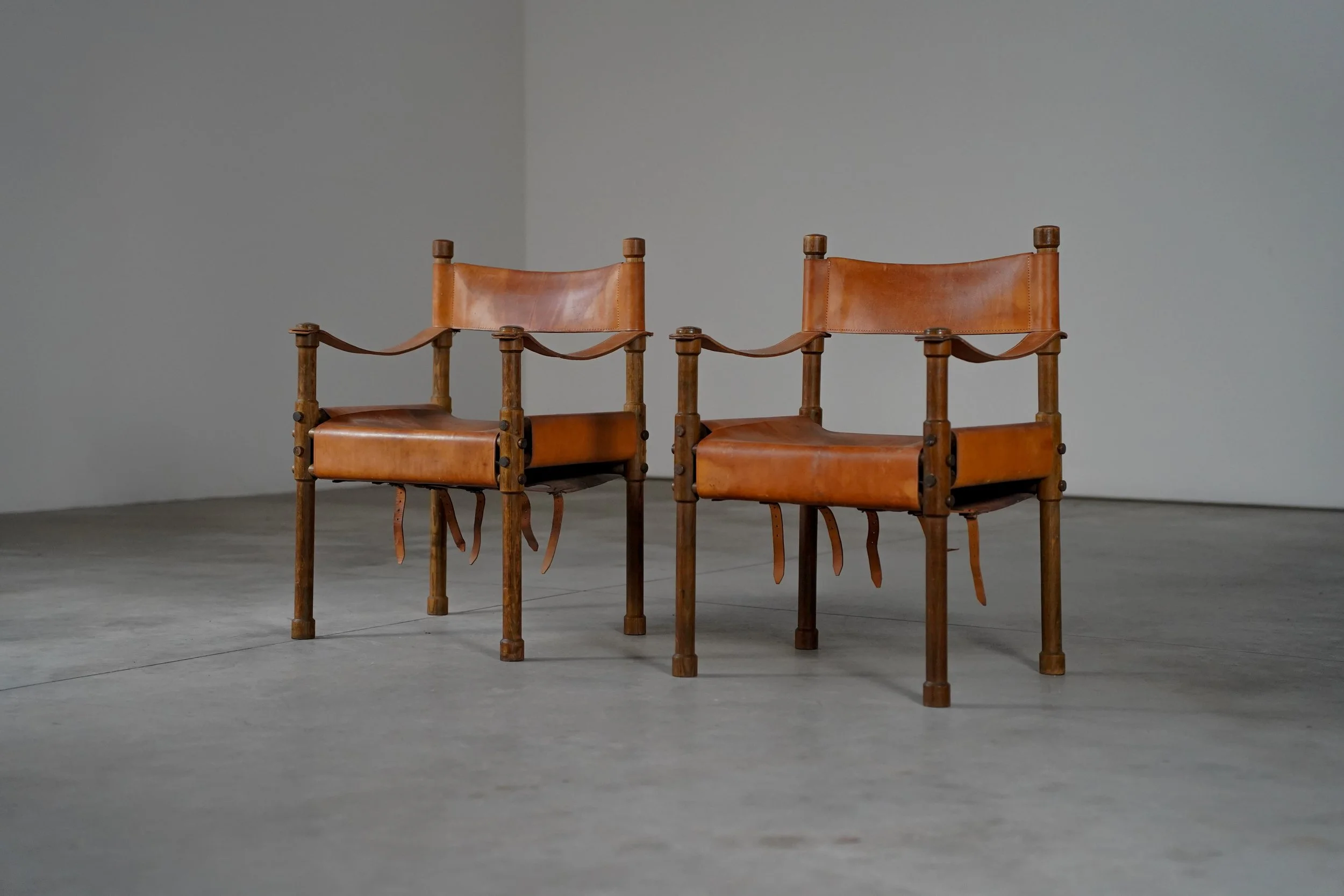 PAIR OF SAFARI ARM CHAIRS