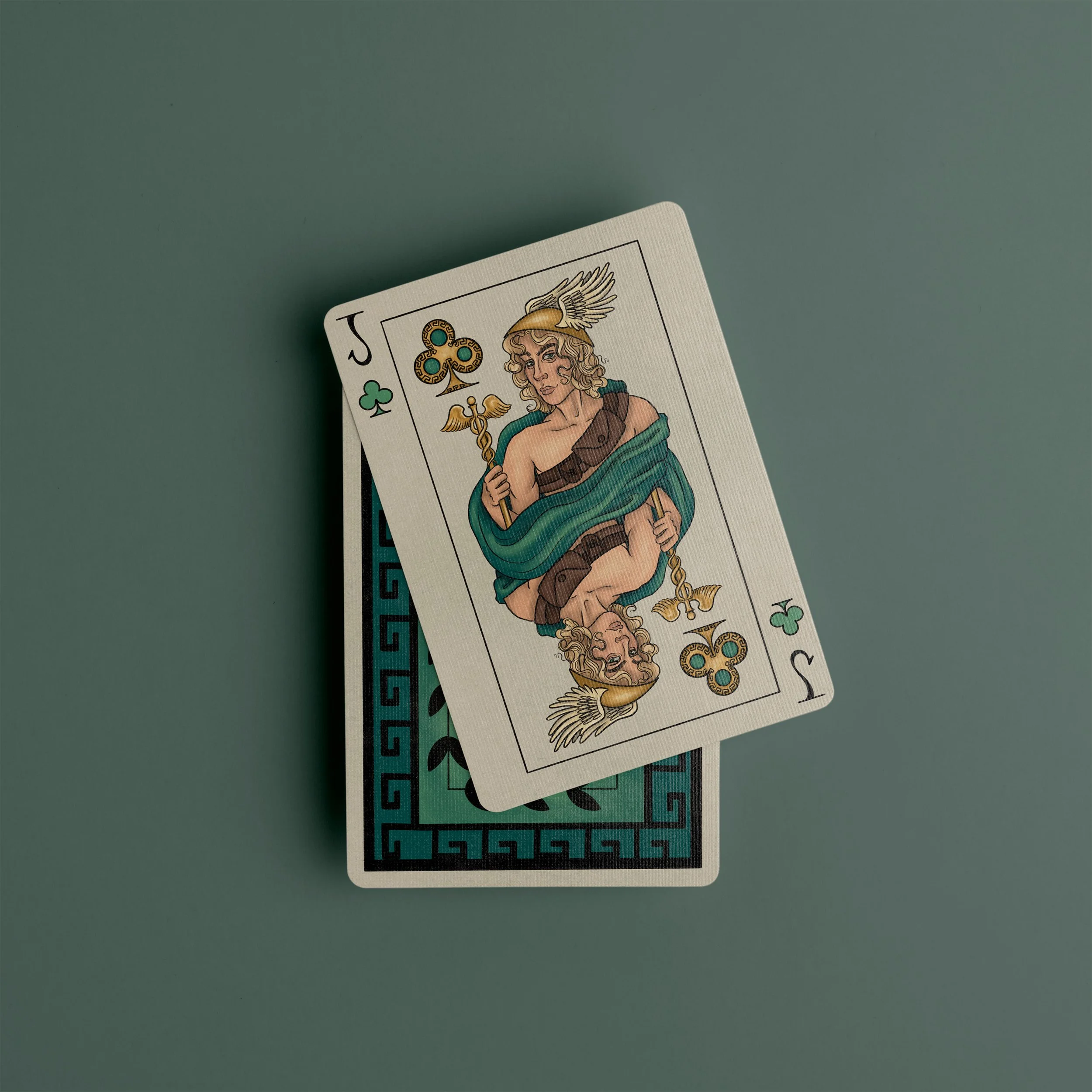 Hermes is the Jack card, shown with a golden winged helmet, a messenger bag, and a golden staff called the Caduceus