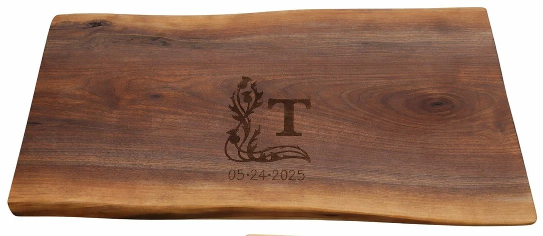 live edge walnut charcuterie board with monogram engraving.png
