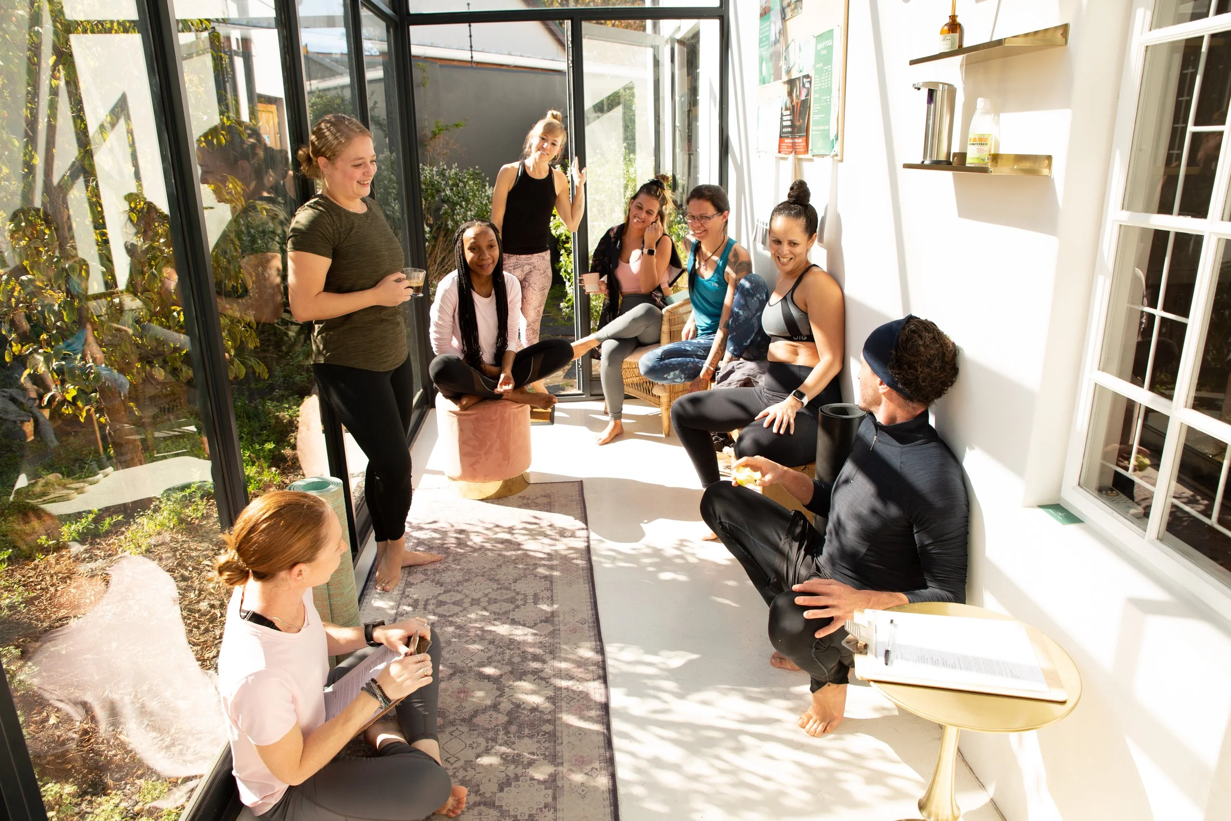 House of Yoga Reception Students Chatting