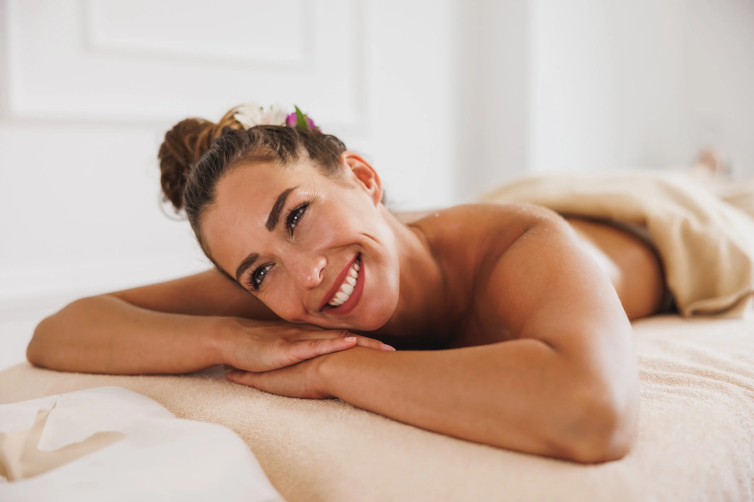 woman-enjoying-massage-in-spa-centre-2023-11-27-05-28-56-utc.jpg