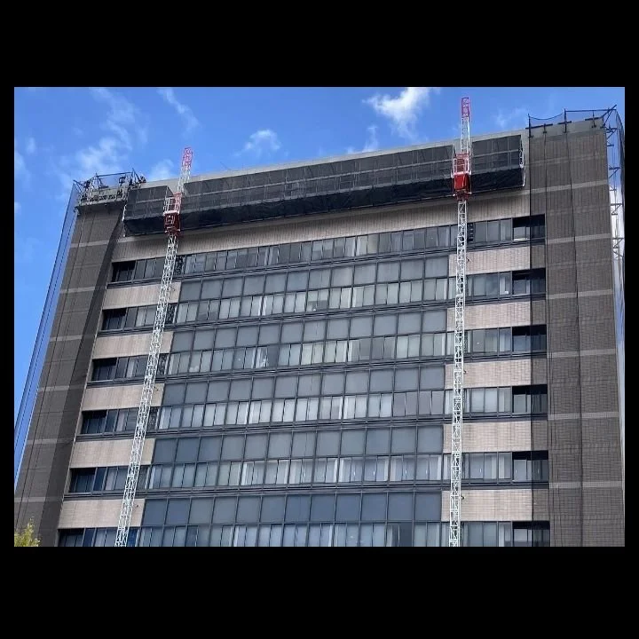 Twin MC 4000 on building with netting.jpg