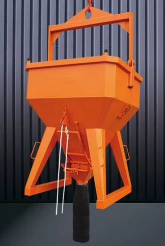 Eichinger 1034 Concrete bucket in orange on a studio back ground that is gray blue in color with corrugated walls behind it.