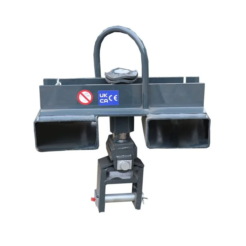 Eichingers 1083 Paver Clamp fork pockets meant to allow a forklift to interface with the clamp. This is a gray steel structure that goes on forklift tines. The background is white.