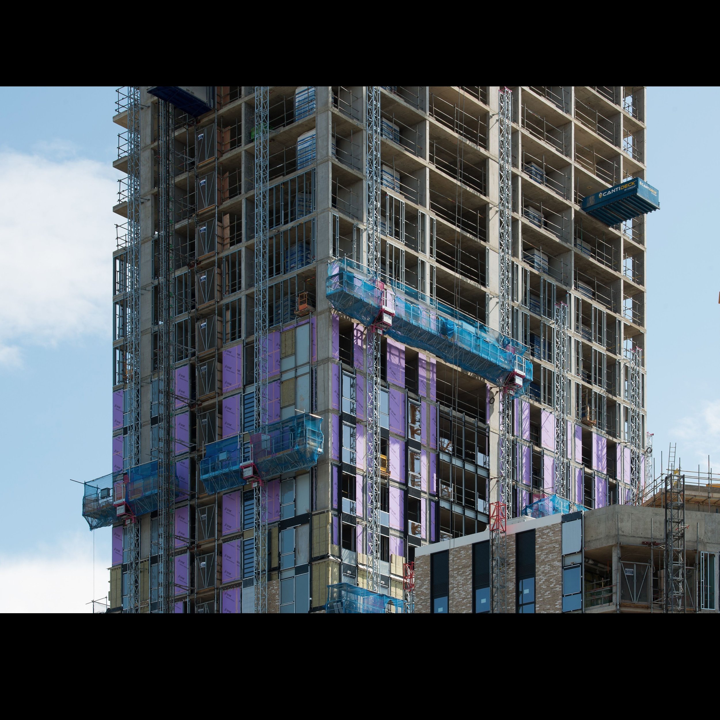 Six Mast Climbers working on a project.jpg