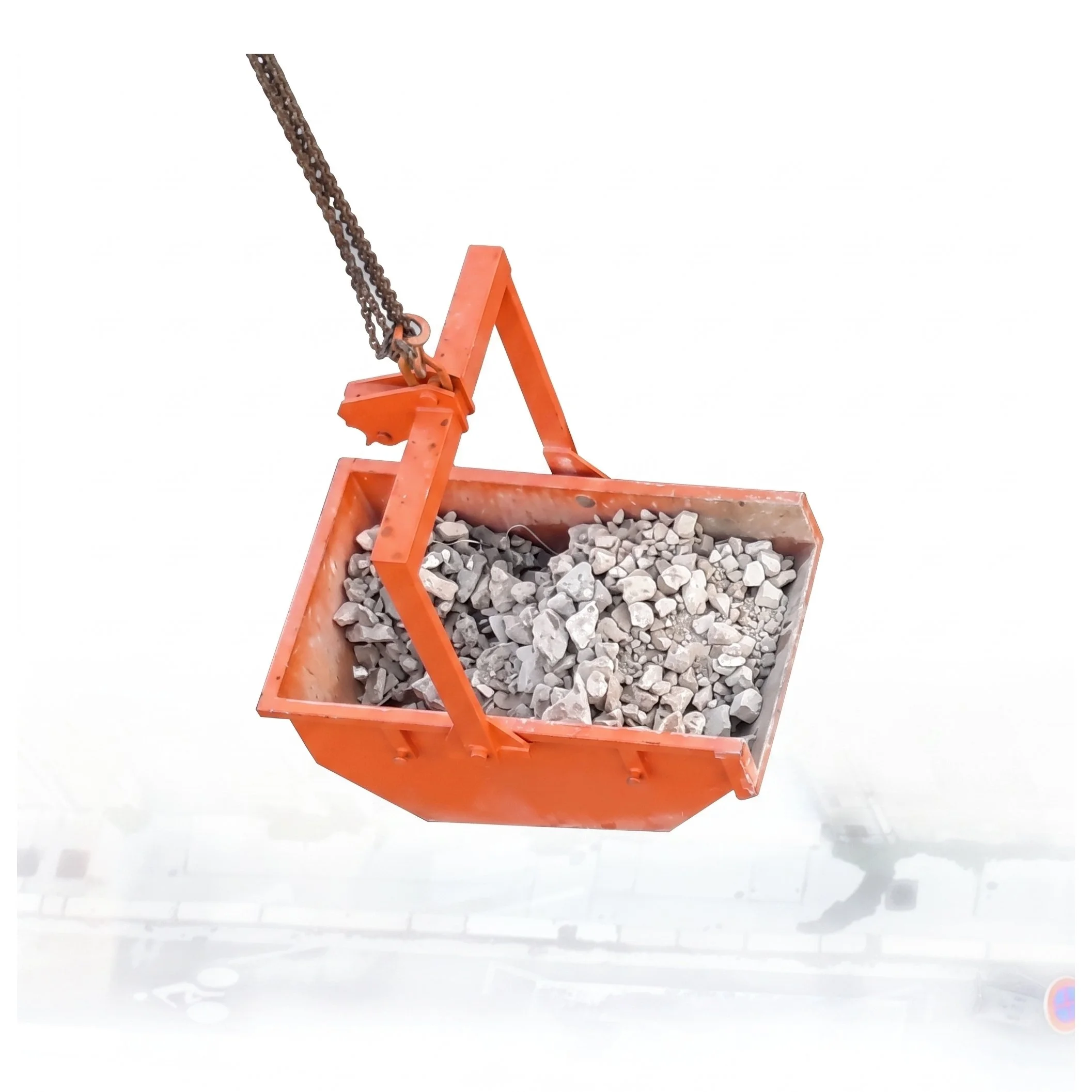 Crane Skip Pan being used to move construction debris with a crane.