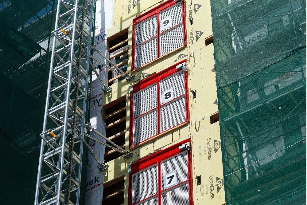 Landing gates on the job site providing safety for all personnel.