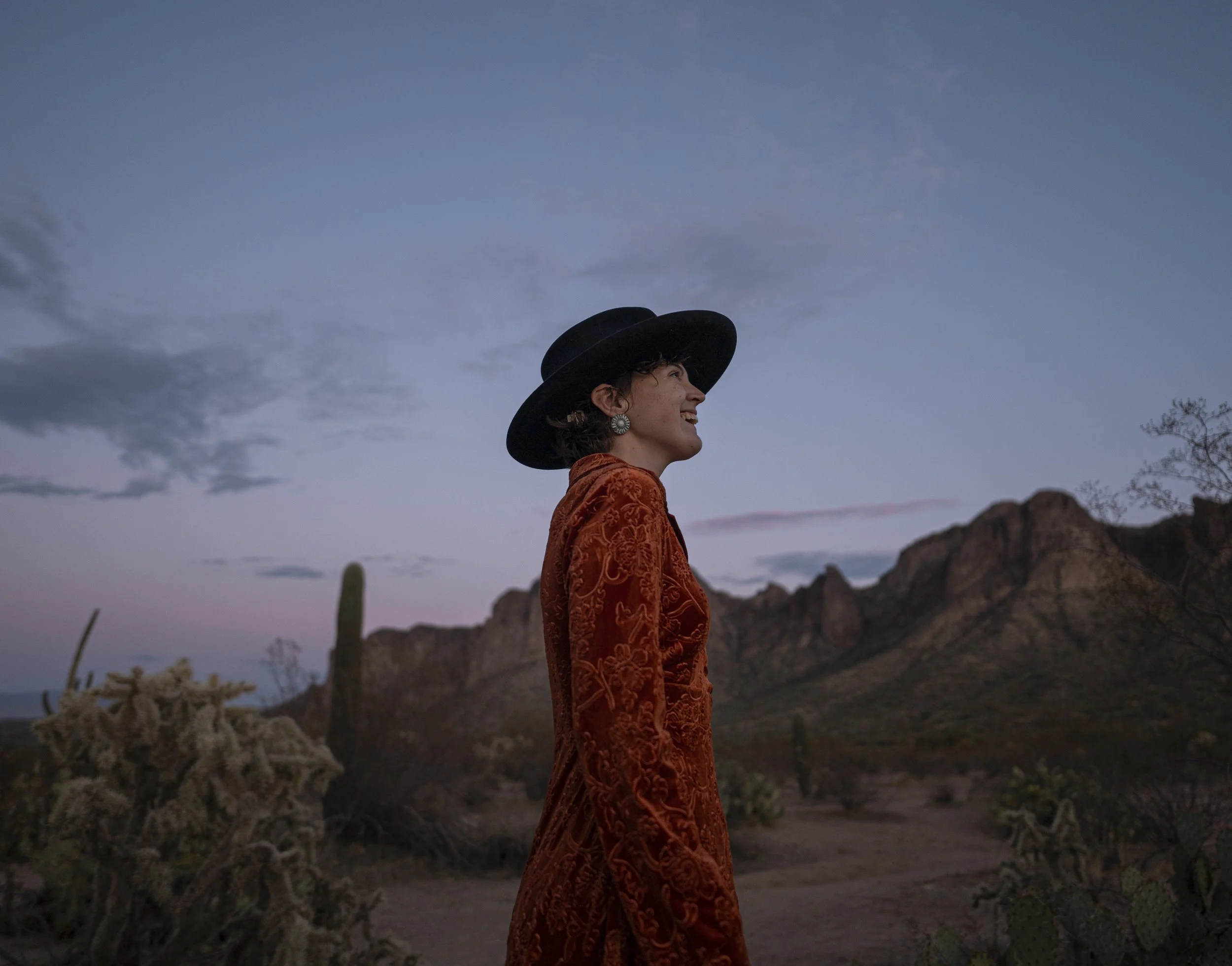 Sydney Smolla stands for a picture in the desert of Phoenix