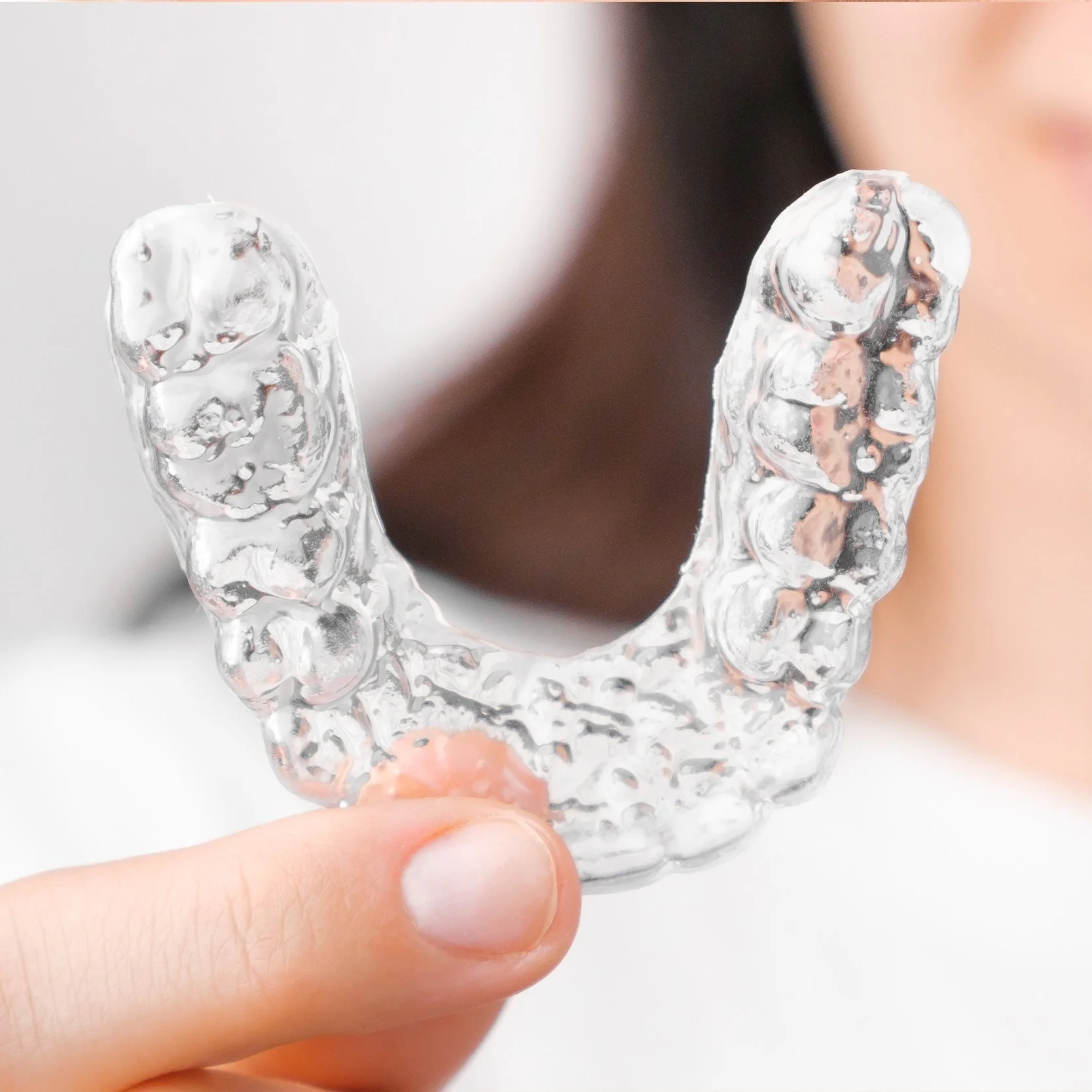 "Clear Aligner Therapy is a modern orthodontic treatment that uses clear, custom-made aligners to gradually shift your teeth into their ideal position.