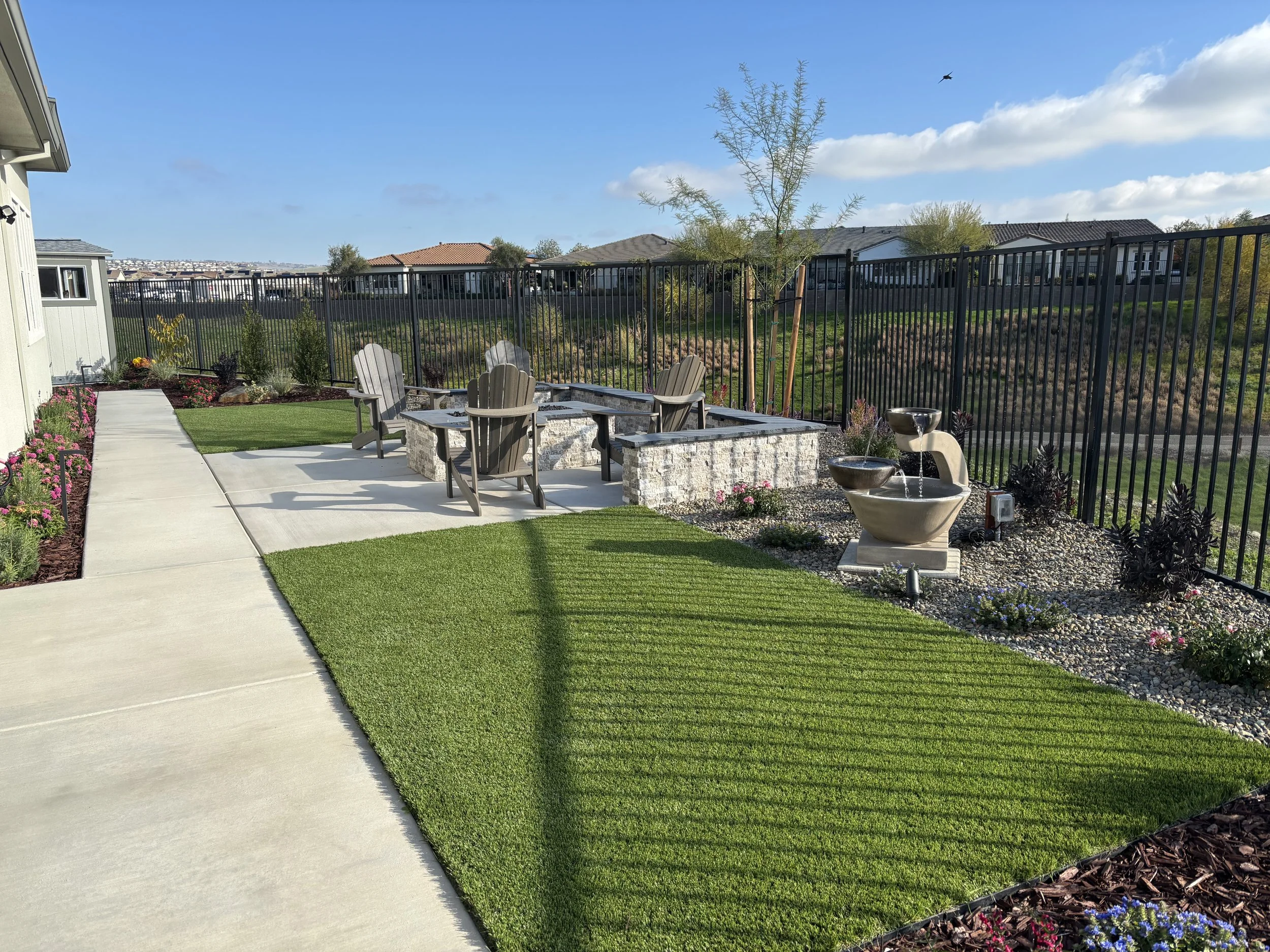 backyard landscape and firepit.jpg