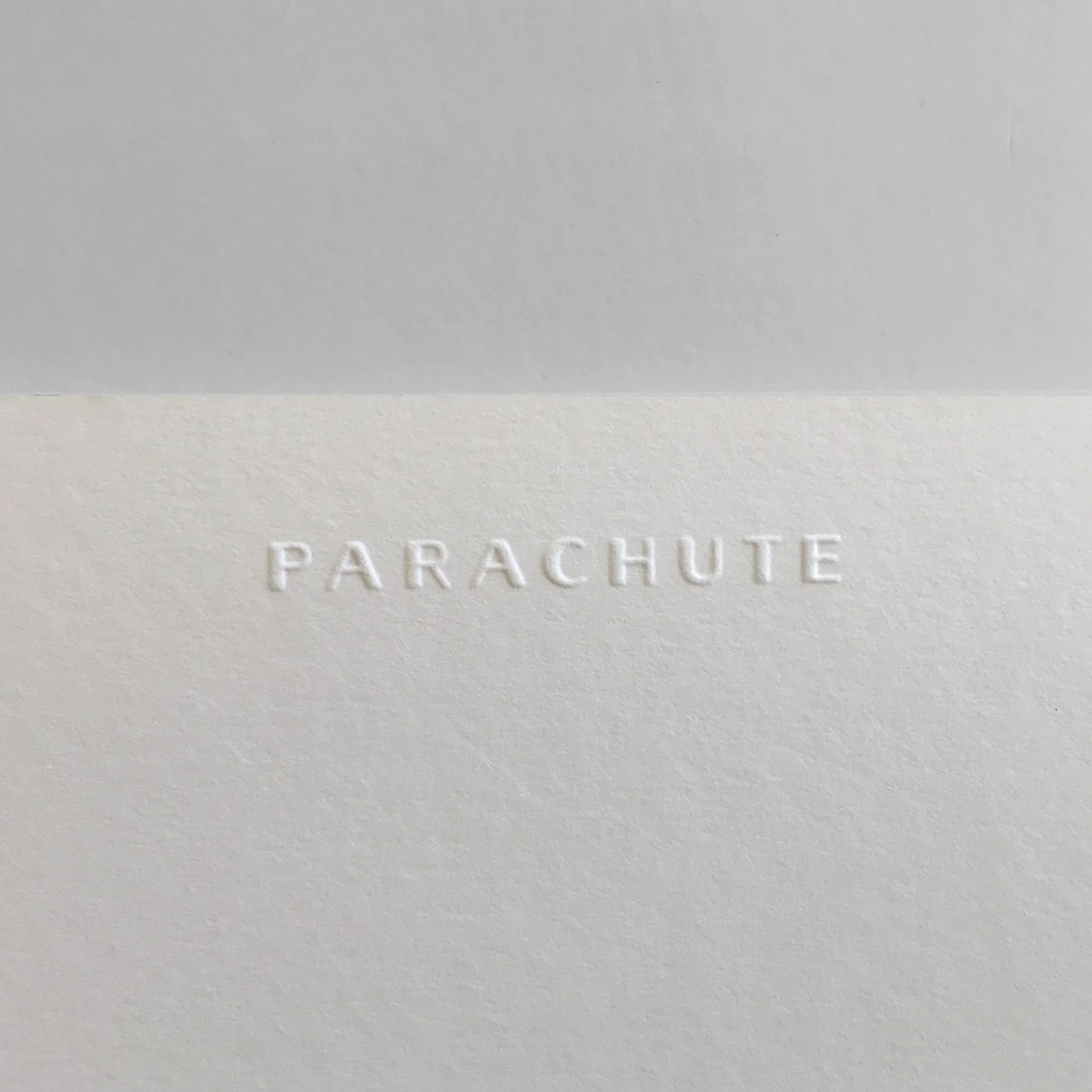 Embossed Tonal Logo Design on Sustainable FSC-Certified Paper