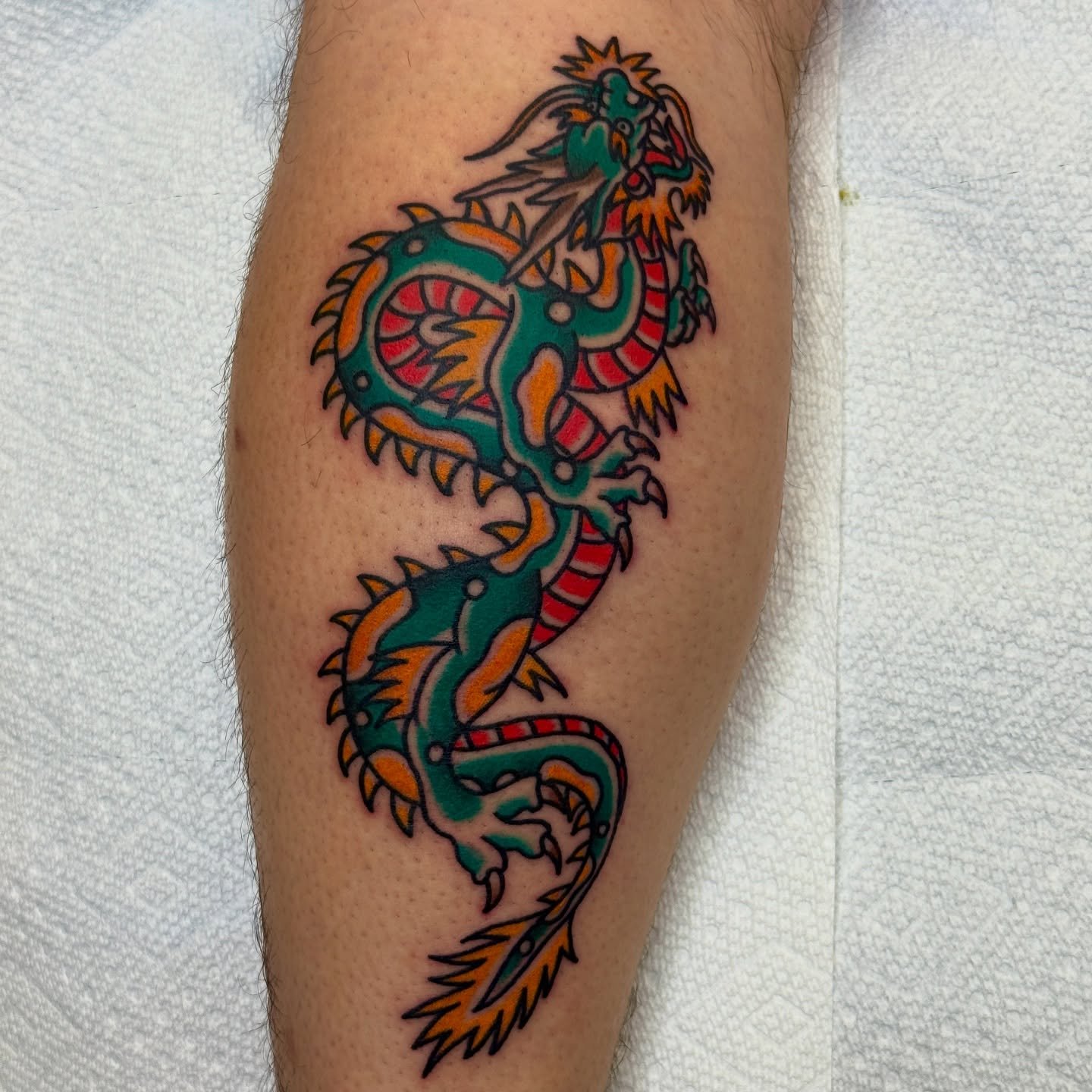 Dragon on the calf by @jeffpatterson_tattoo 💥 Come holla, we are here 12-8:PM

#shreveport 
#louisiana 
#tattooshop