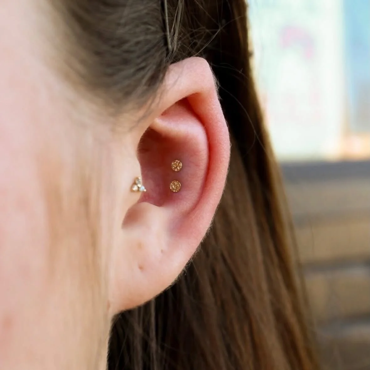 Double conch with gold hammered disk done by @darby.pokes 
Walk-ins welcome 
Or schedule or piercing appointment online! 
Here 12-8!
(318)-562-3021☎️