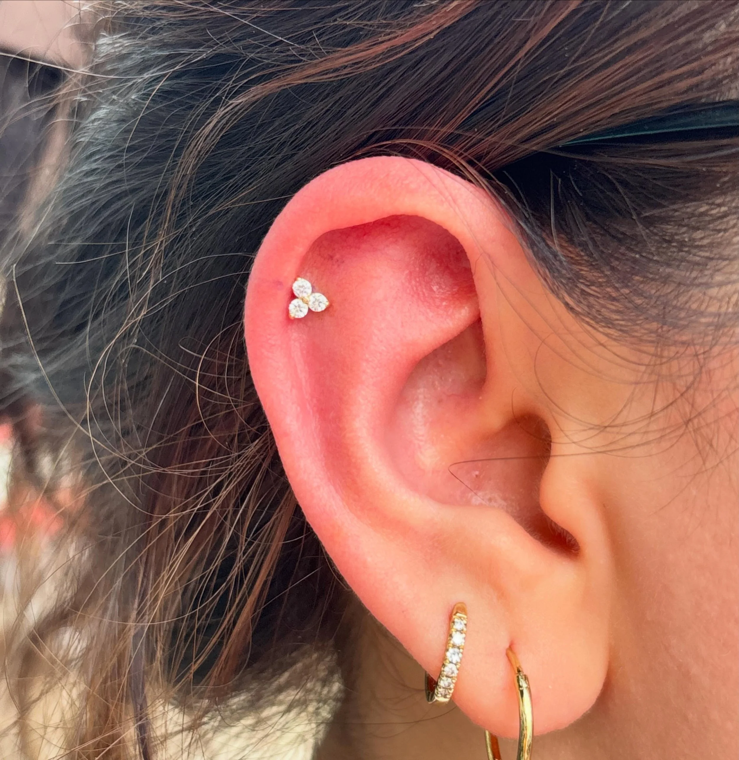 Pretty helix pierced by our apprentice @justa.lilpinch
If you're interested in booking with our piercing apprentice, go to our website ghostfiretattoo.com to schedule something cool!
#piercingapprentice #helixpiercing #14kgold