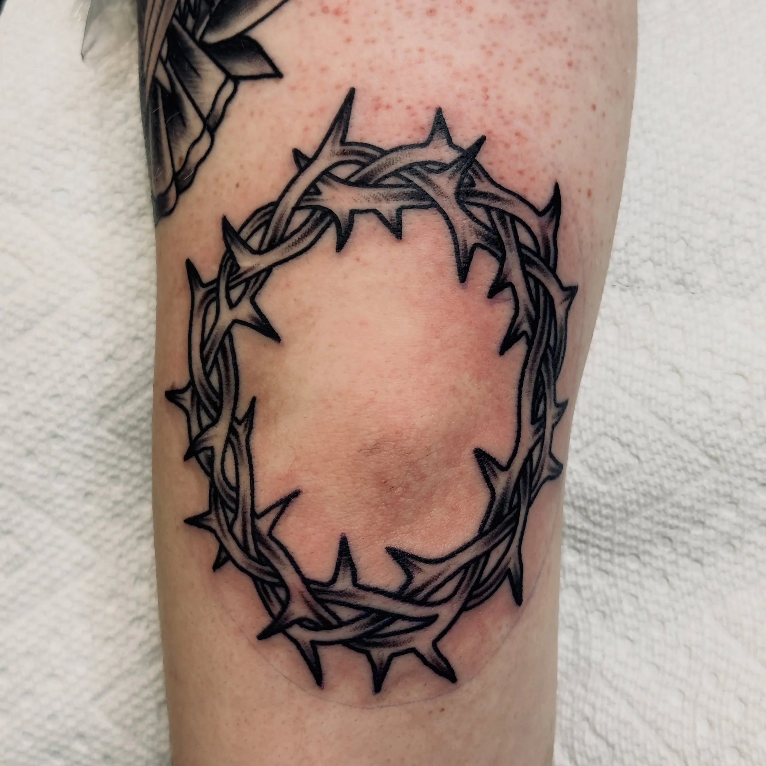 Crown of thorns by @jeffpatterson_tattoo 
Stop on in, we are taking walk-ins and appointments www.ghostfiretattoo.com