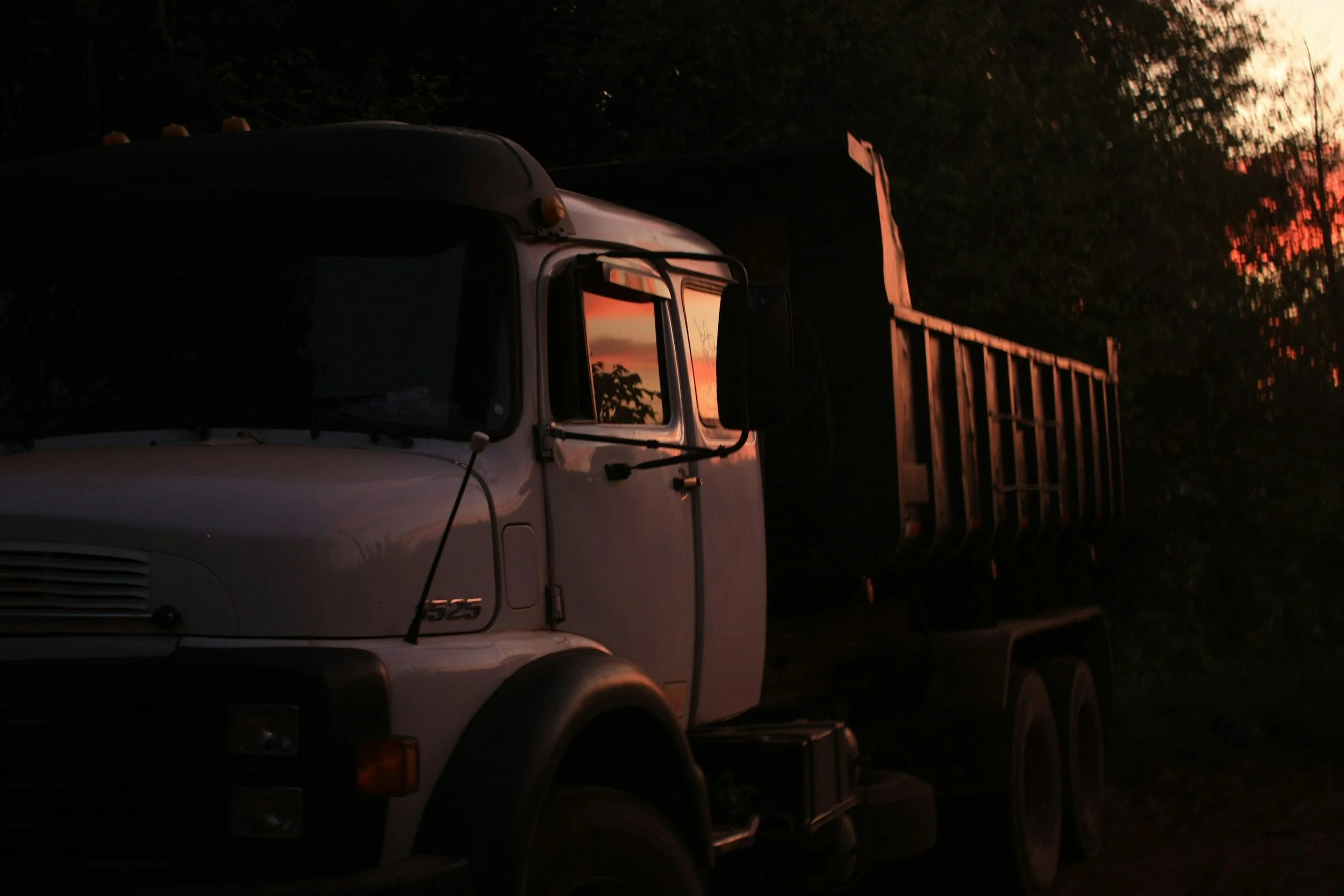 Dump truck in twilight lighting