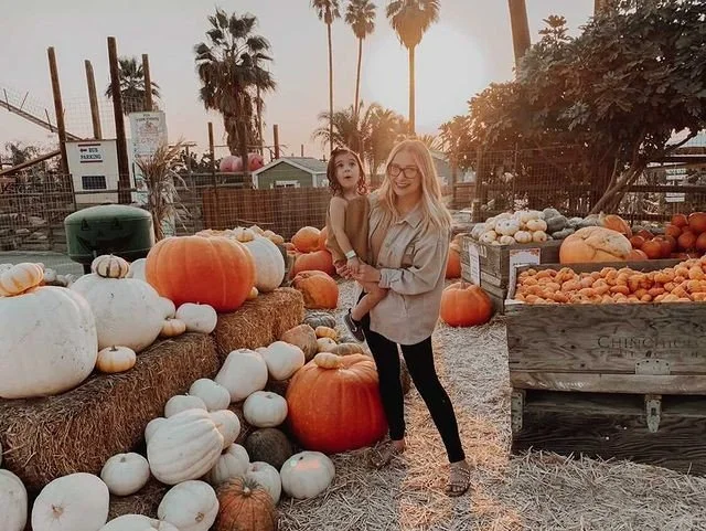 Family choosing pumpkins at Murray Family Farms