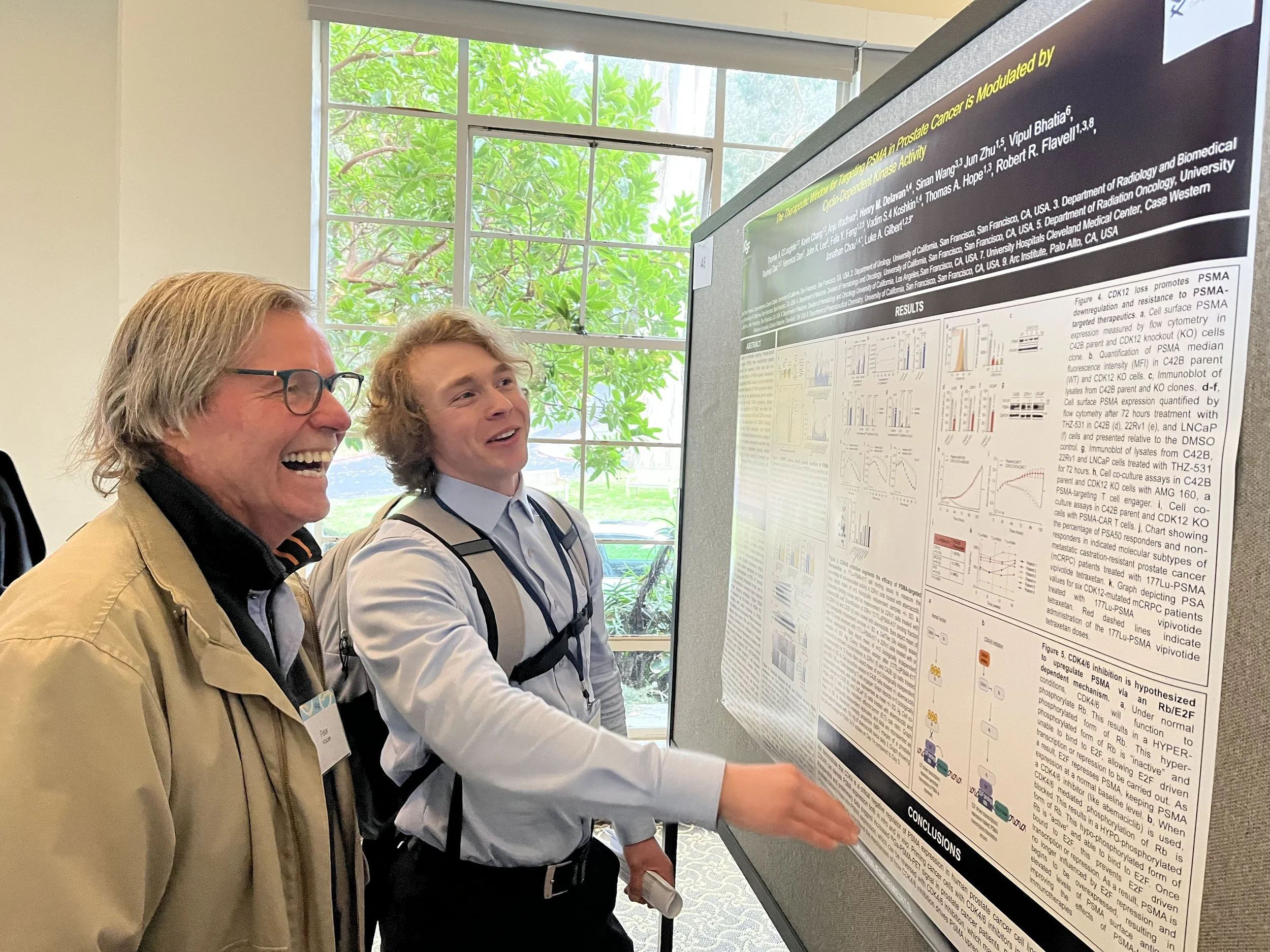 Prostate Cancer Retreat Poster Session (Nov 2025) - Henry sharing his research with our patient advocate, Peter!