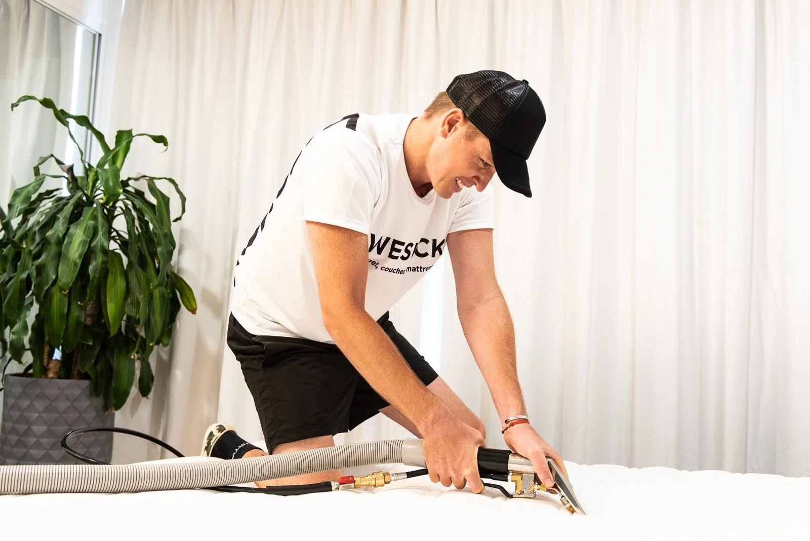 WeSuck cleaner steam cleaning a mattress