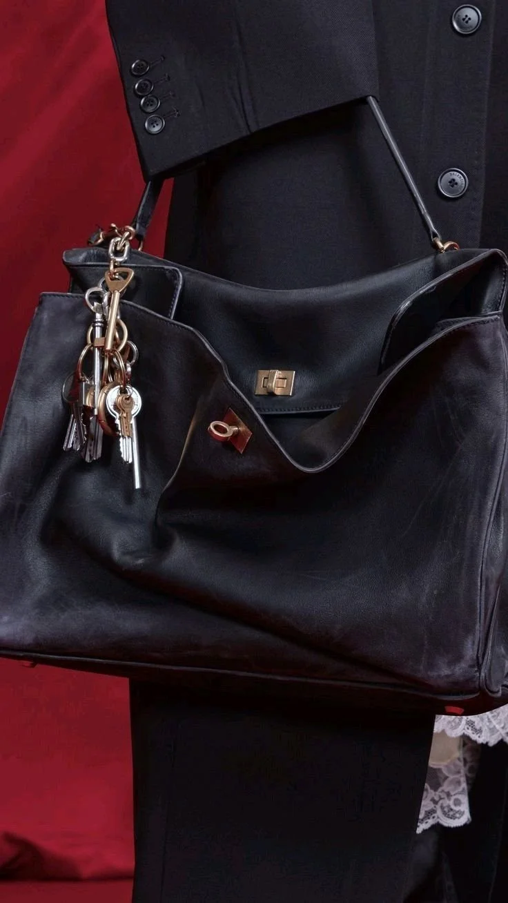 THE DEATH OF DESIGNER BAGS