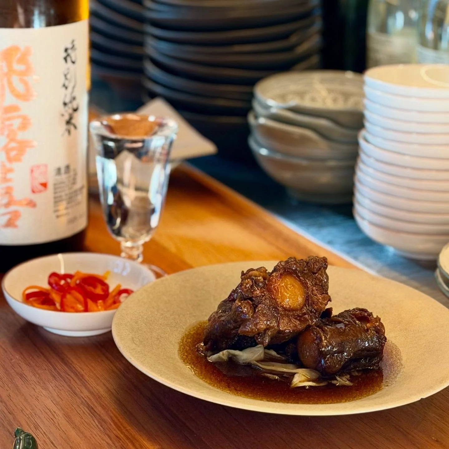 Now on the menu: Slow-cooked oxtail nitsuke, cabbage, and a side of pickled chilli.