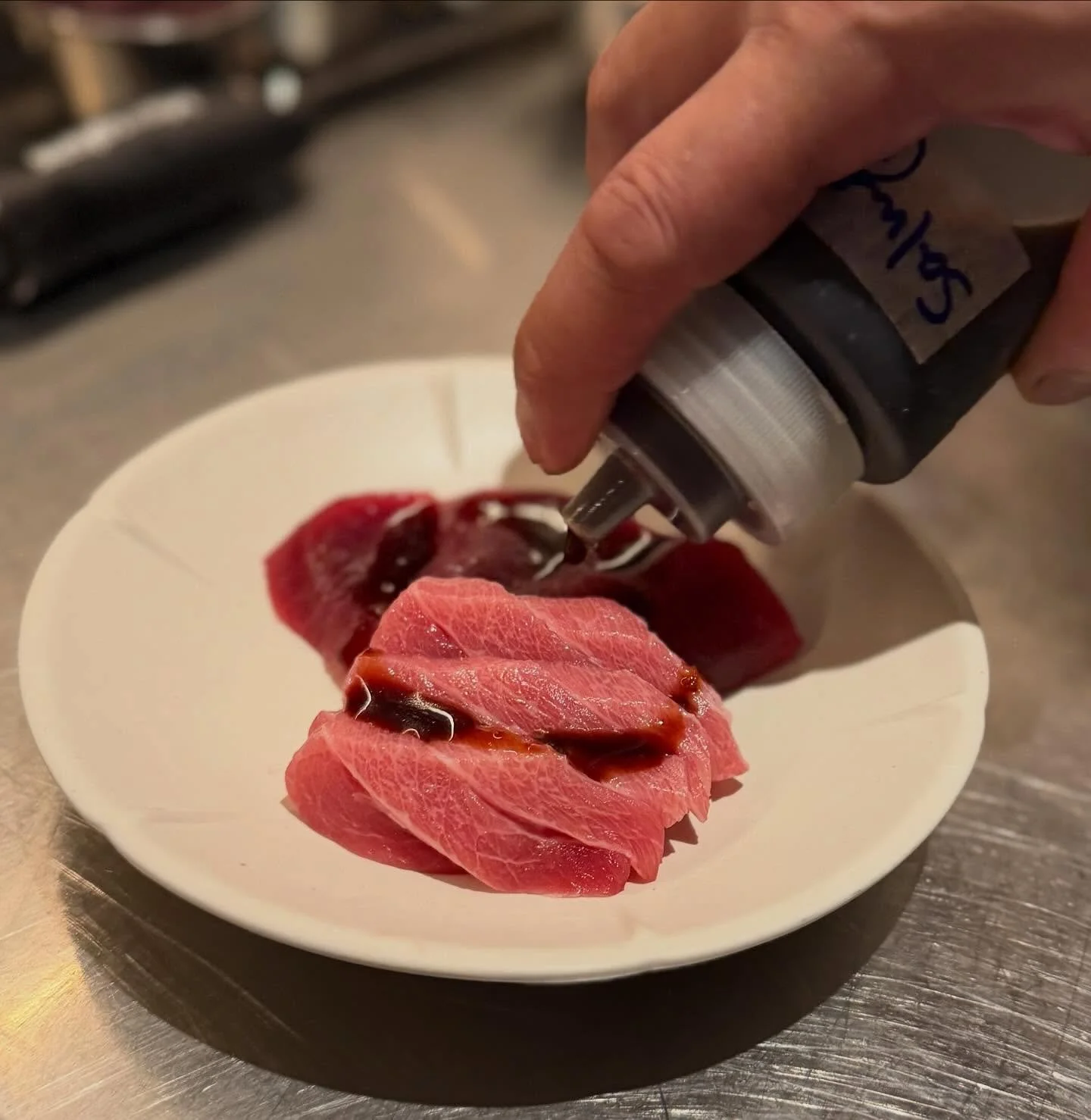 Bluefin tuna sashimi with our house-smoked soy and wasabi stem.
Limited portions from tonight, until sold out.