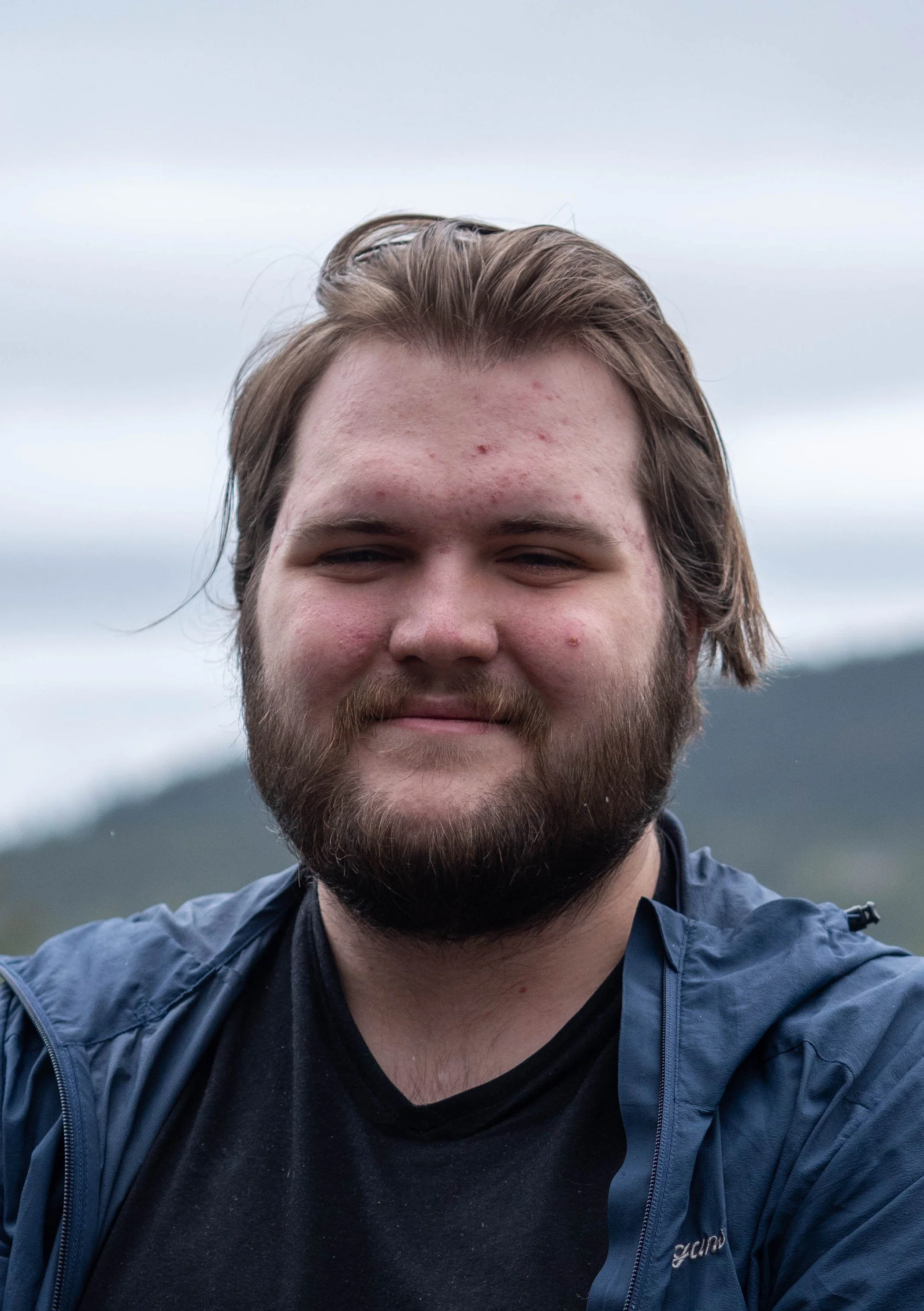 Profilbilde av Kommunikasjons-/ og internasjonalt ansvarlig Ask Oliver Vighals