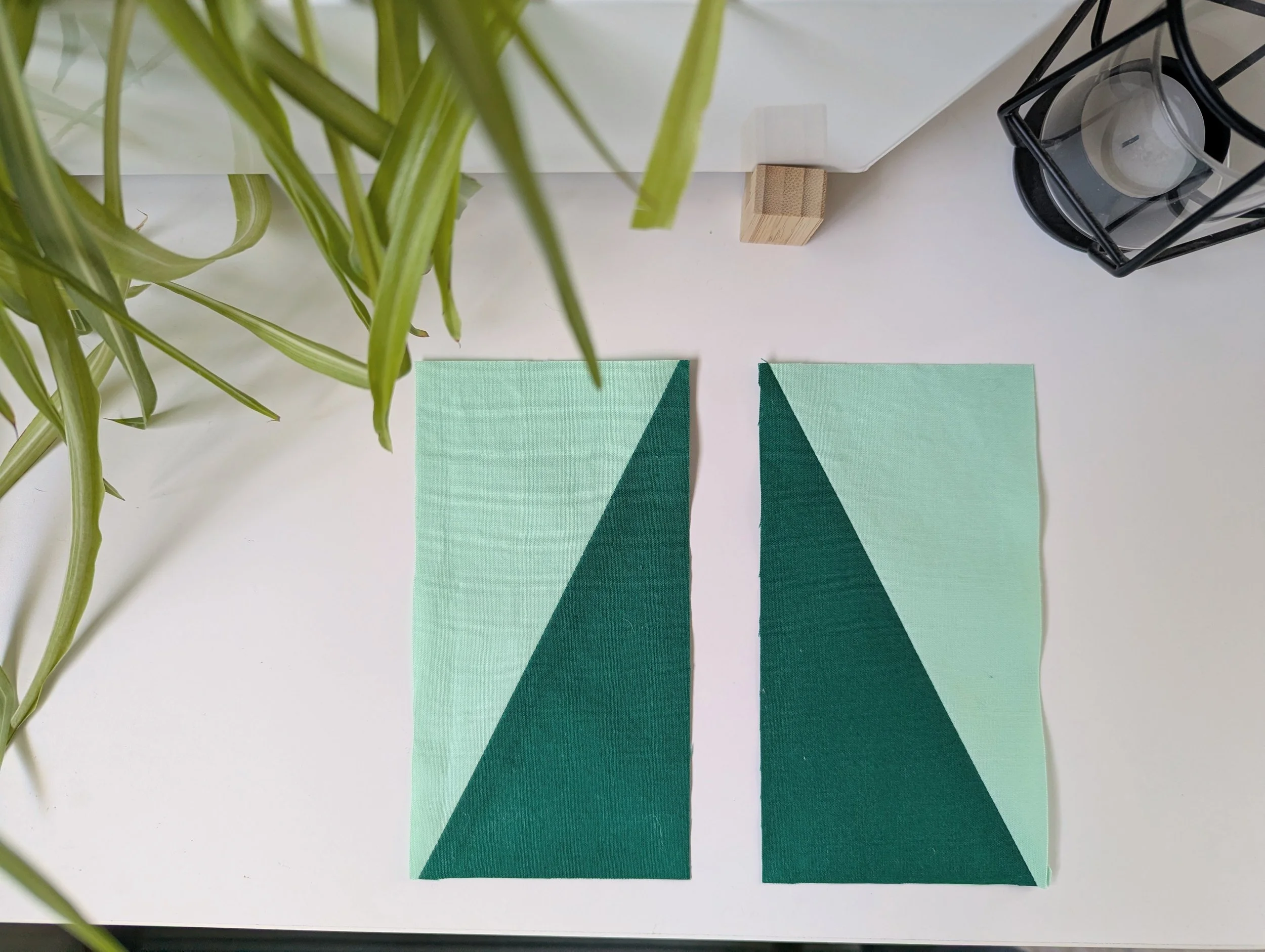Two mirrored half rectangle triangles (HRTs) in shades of green