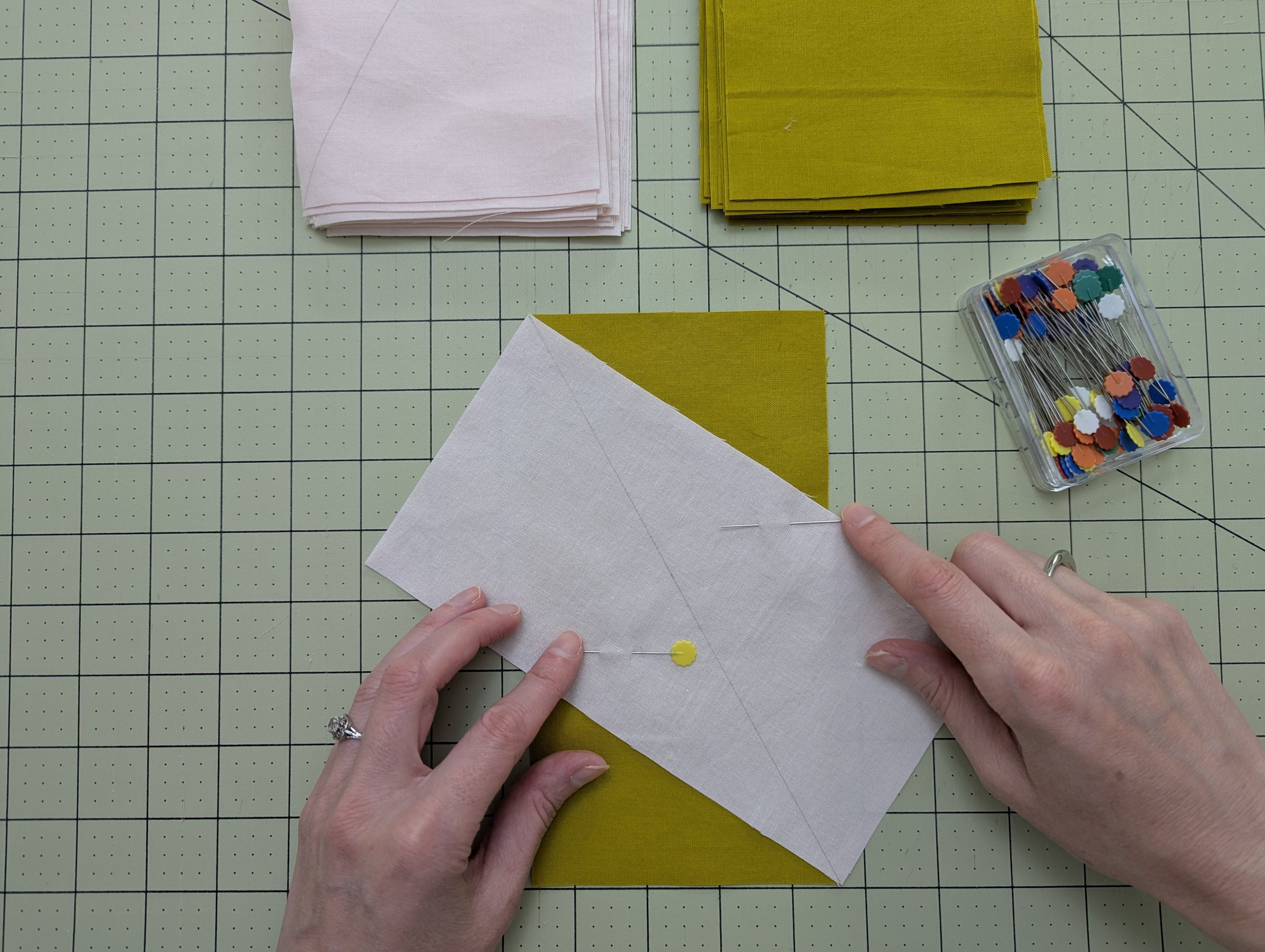 Two rectangle fabric pieces pinned together