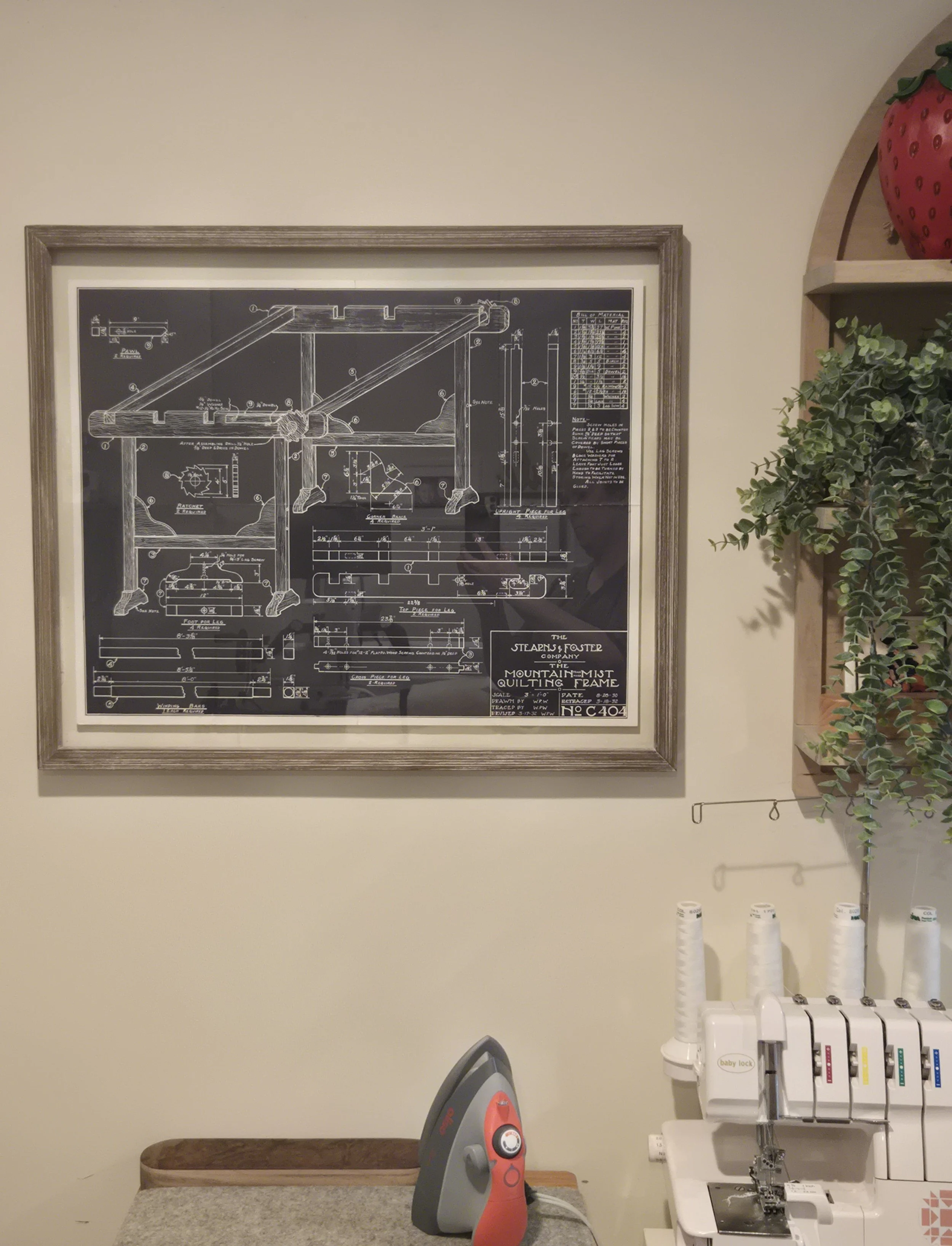 Framed art in the sewing space of Maggie of Snug & Stitch