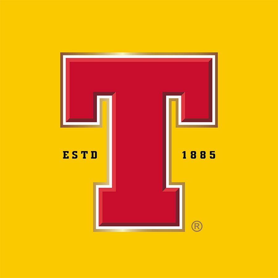 Logo of the University of Maryland featuring a large red letter T with a yellow background and black text reading "ESTD 1885."