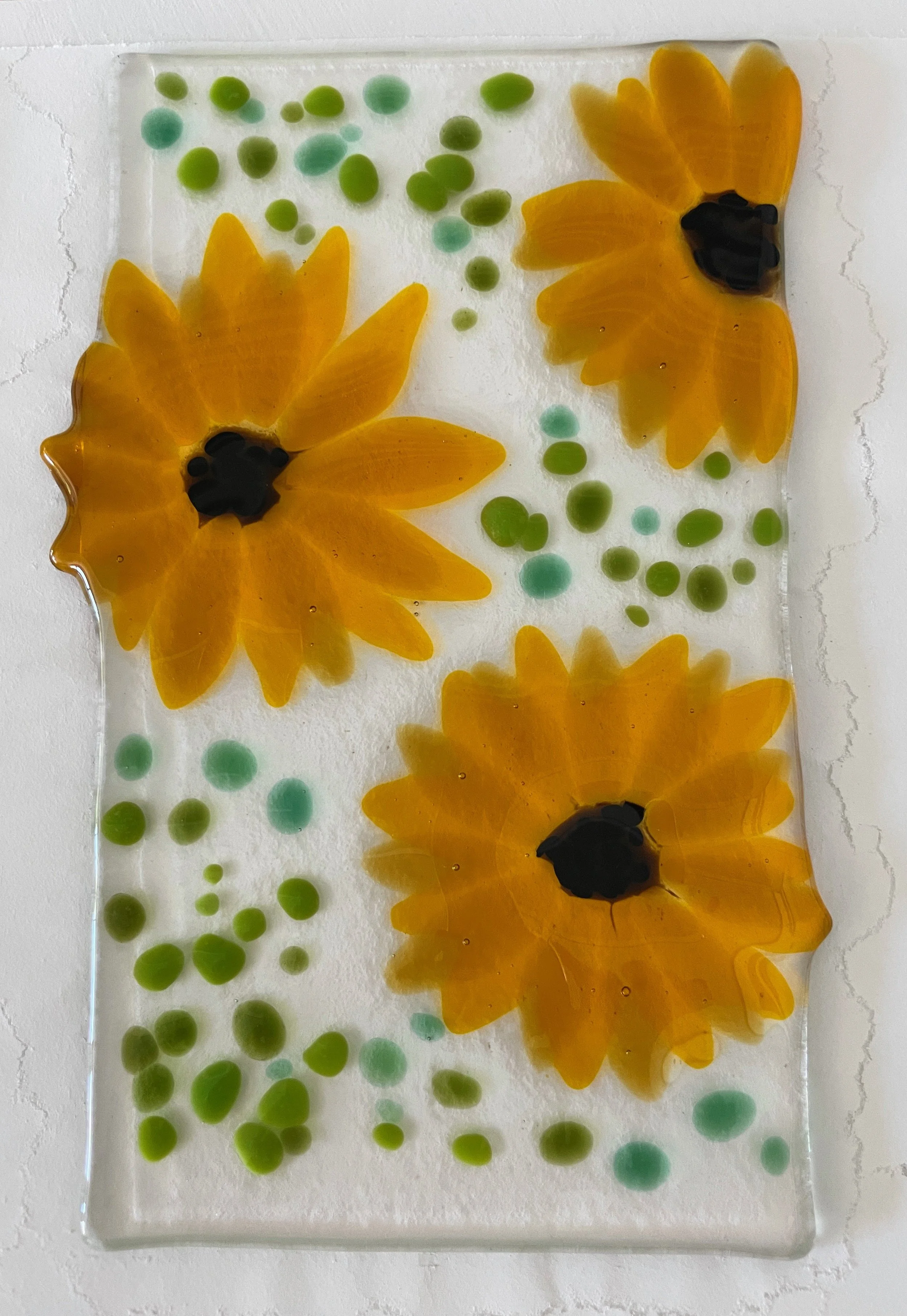 Decorative glass with yellow flower design