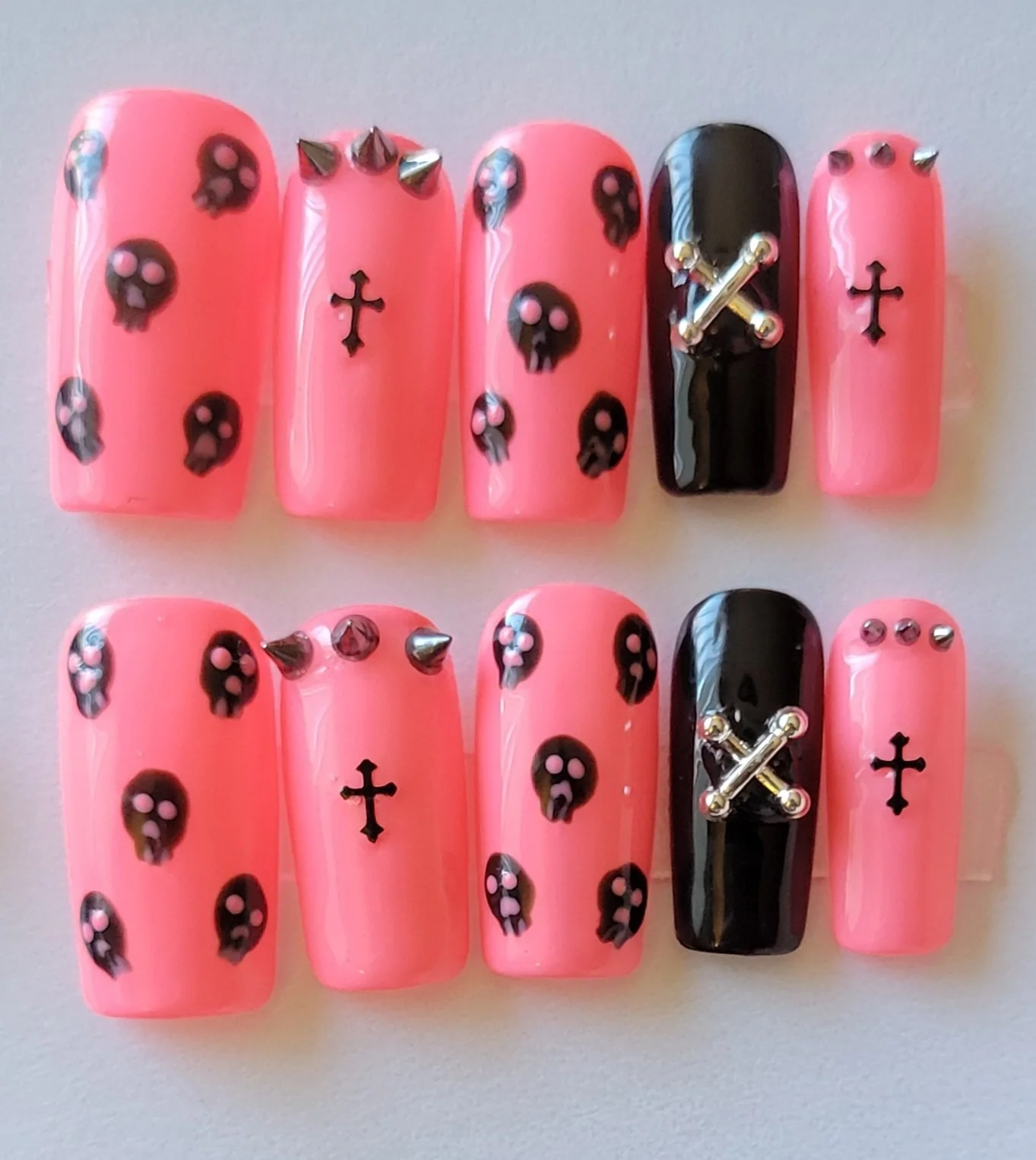 pink skull press-ons.jpg