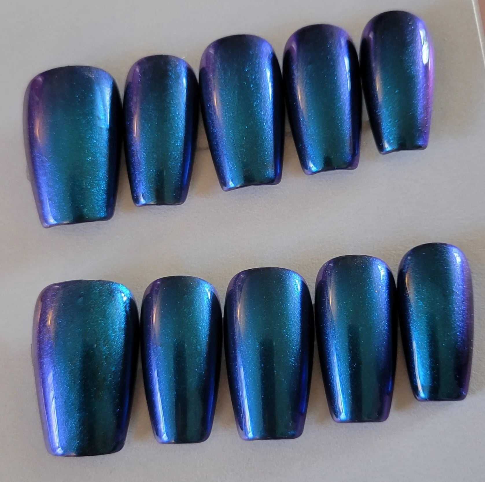 bluish purpley chrome nails.jpg