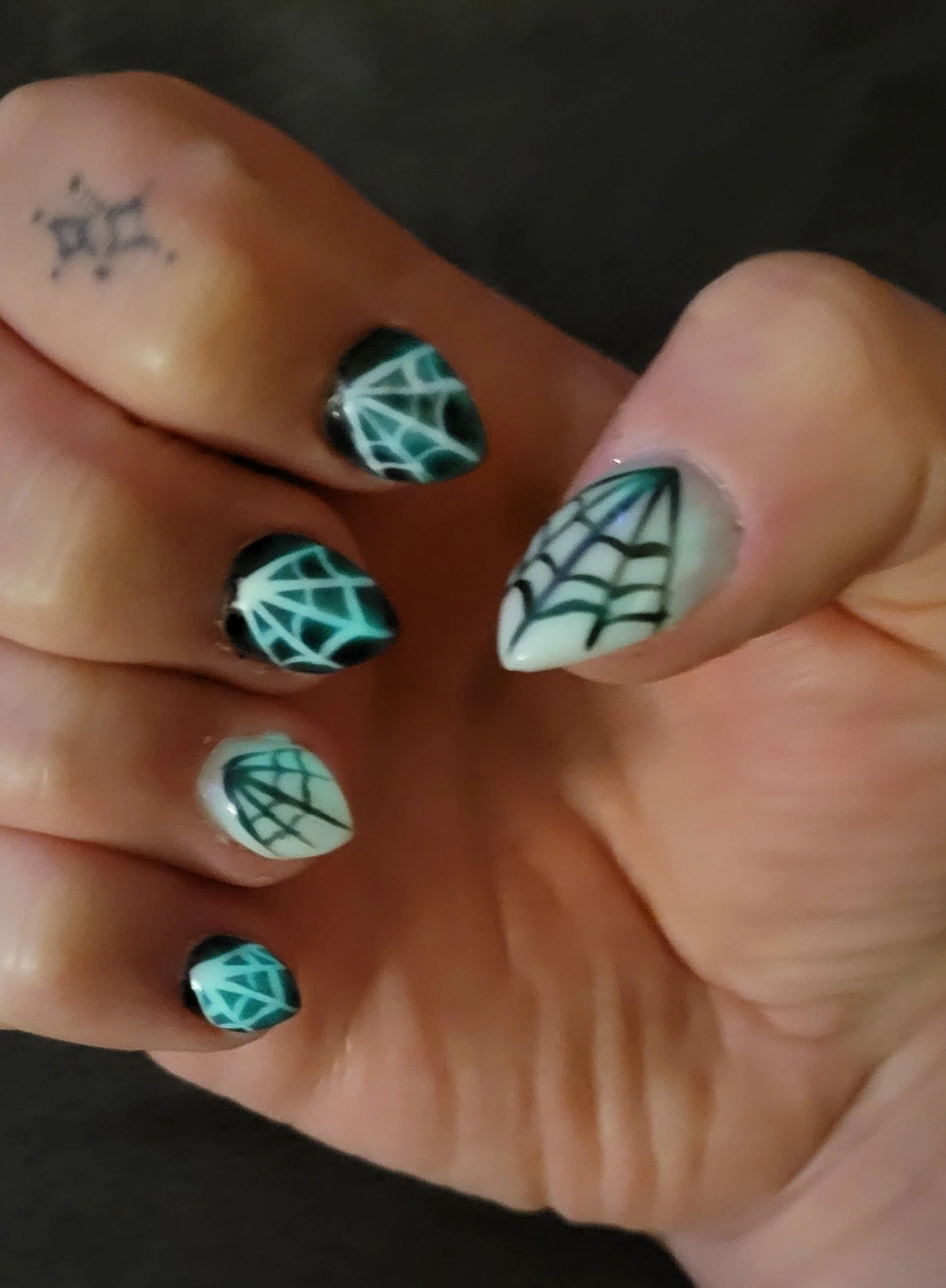 glow in the dark web nails.jpg