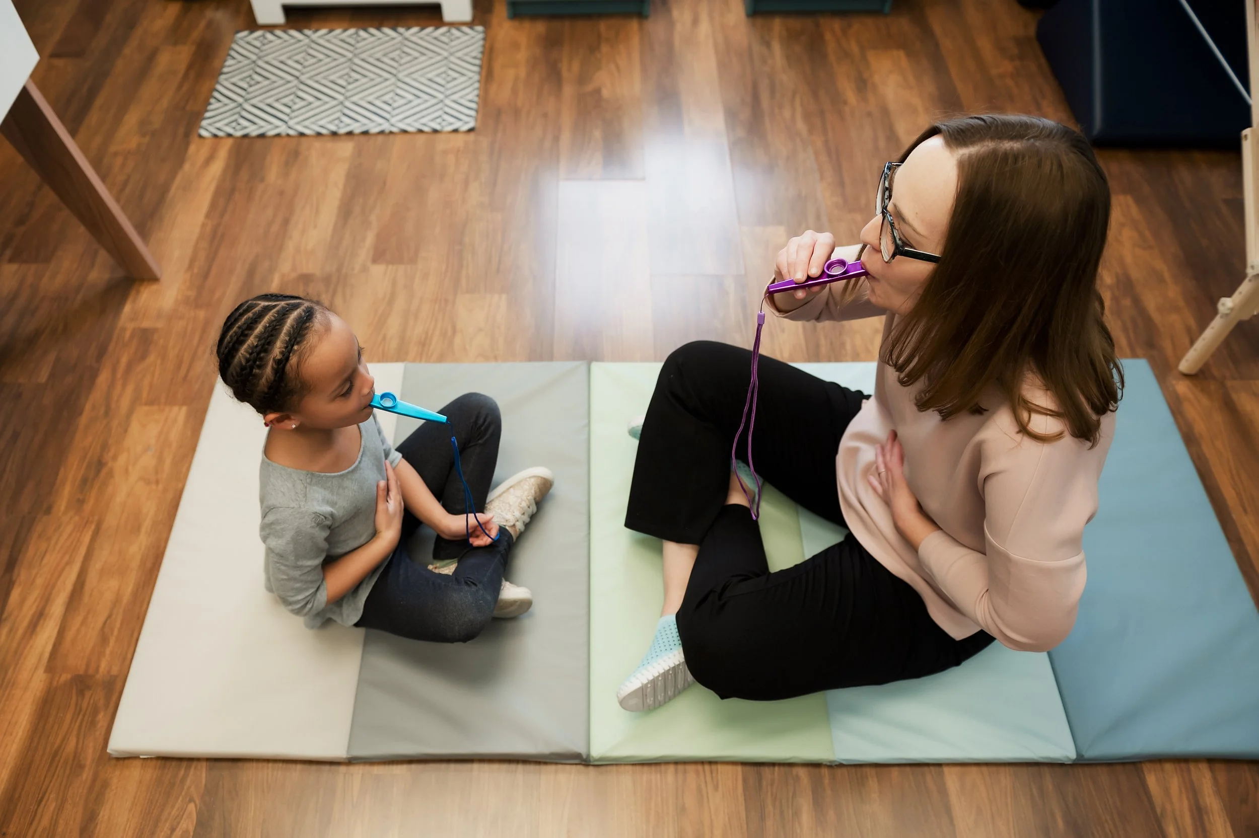 Pelvicsmart-pediatric kazoo blowing from above-pelvic-floor-kentucky.jpg