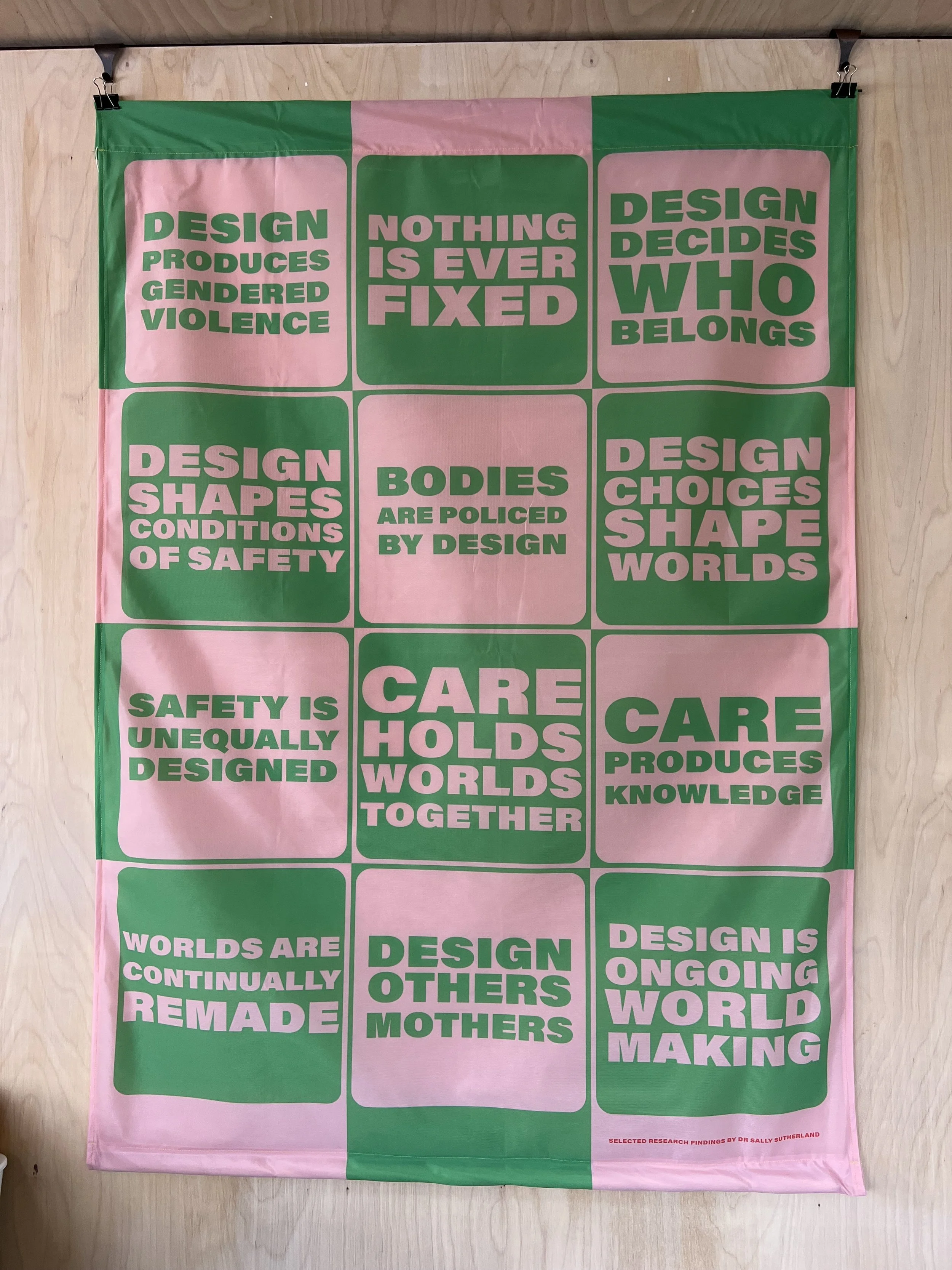 A Flag of Worlds Made Through Care