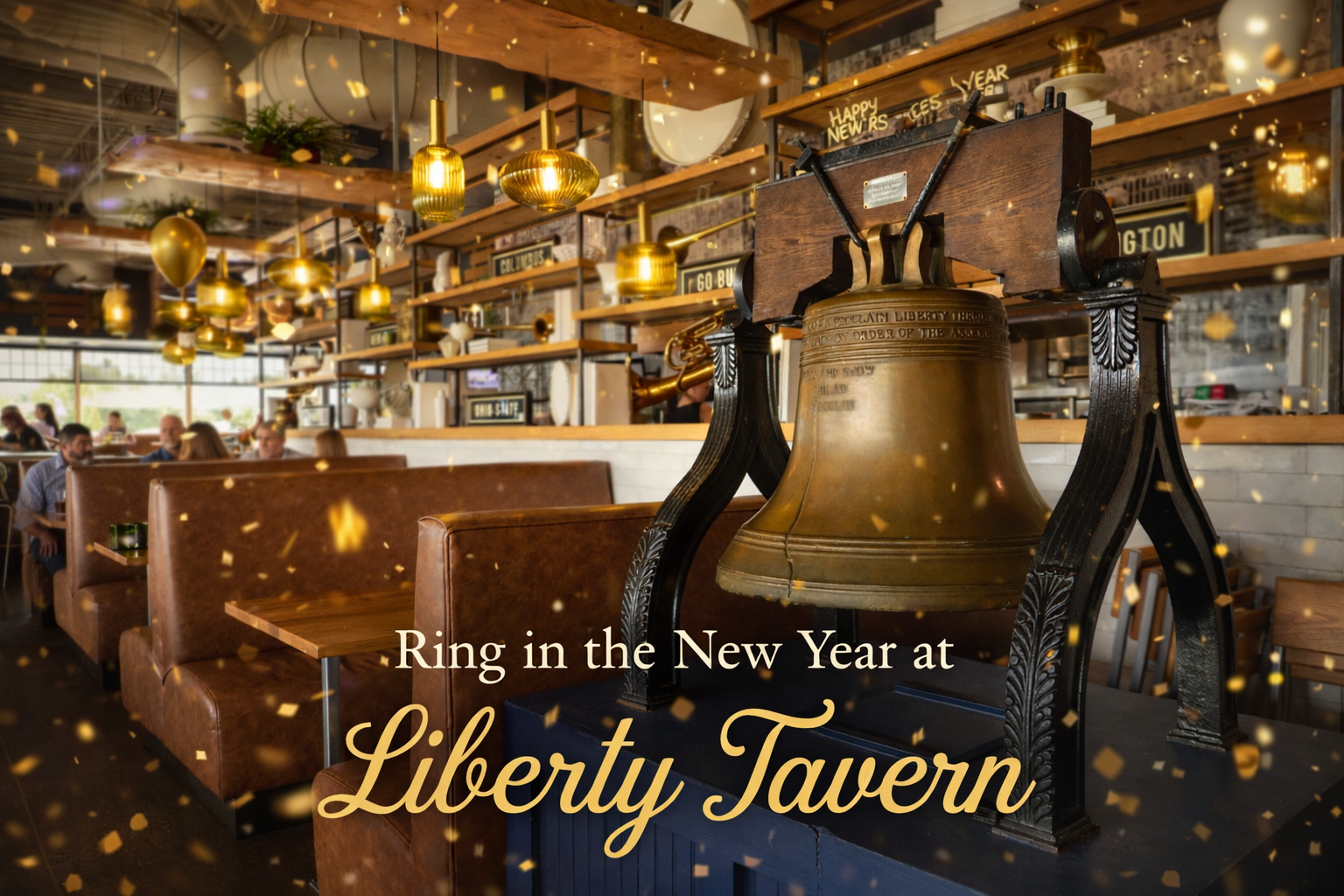 Liberty Tavern dining room decorated for New Year’s Eve, featuring a historic liberty bell display surrounded by leather booths, warm gold pendant lights, and subtle gold confetti creating a festive, celebratory atmosphere.