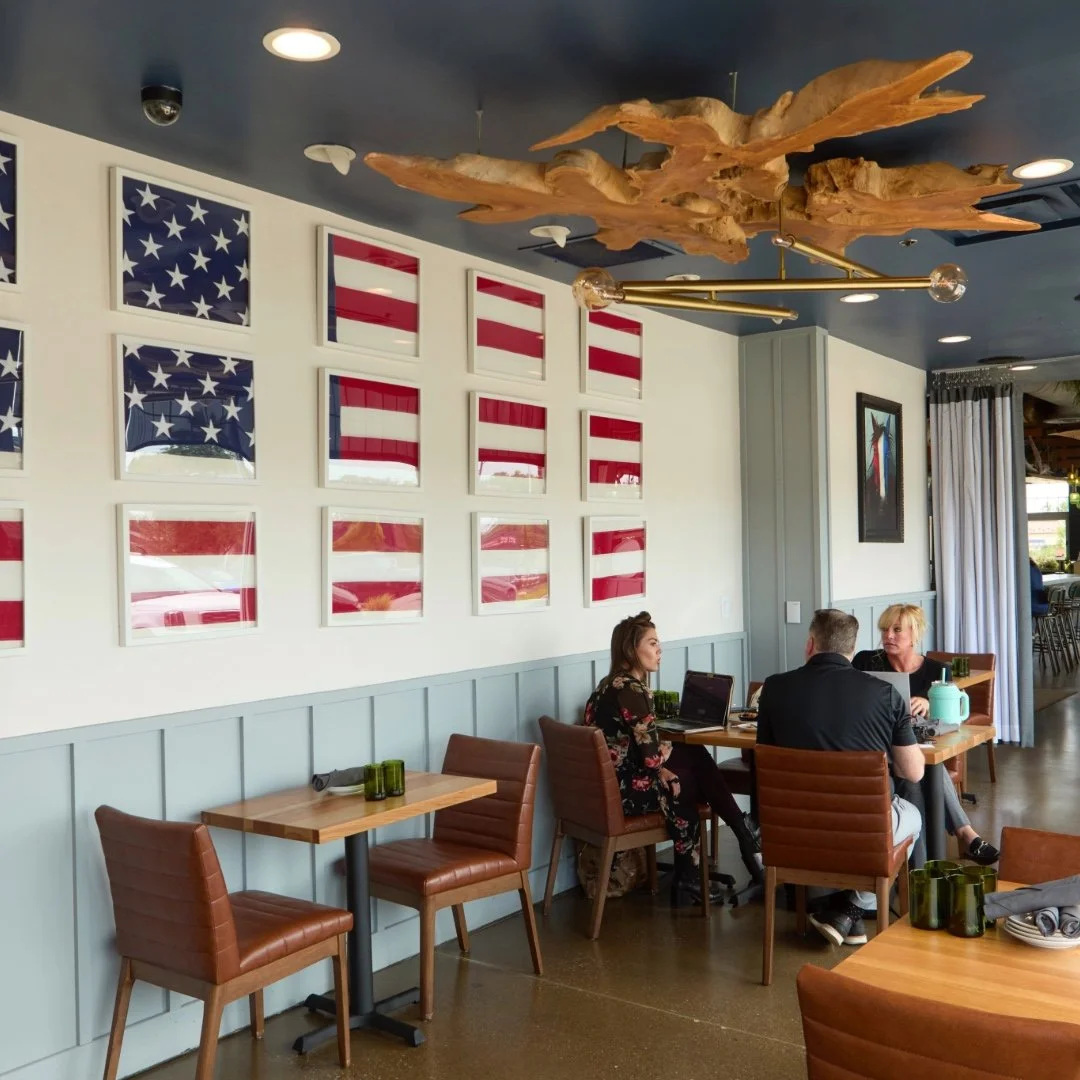 Guests enjoying a private dining experience at Liberty Tavern Polaris, featuring modern American décor and flexible event space in Columbus.