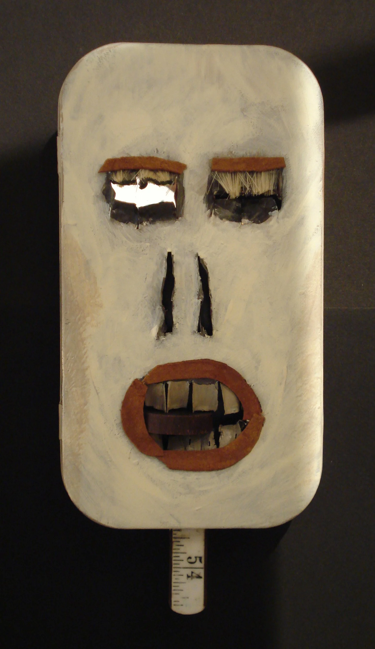 tin skeleton head.jpeg