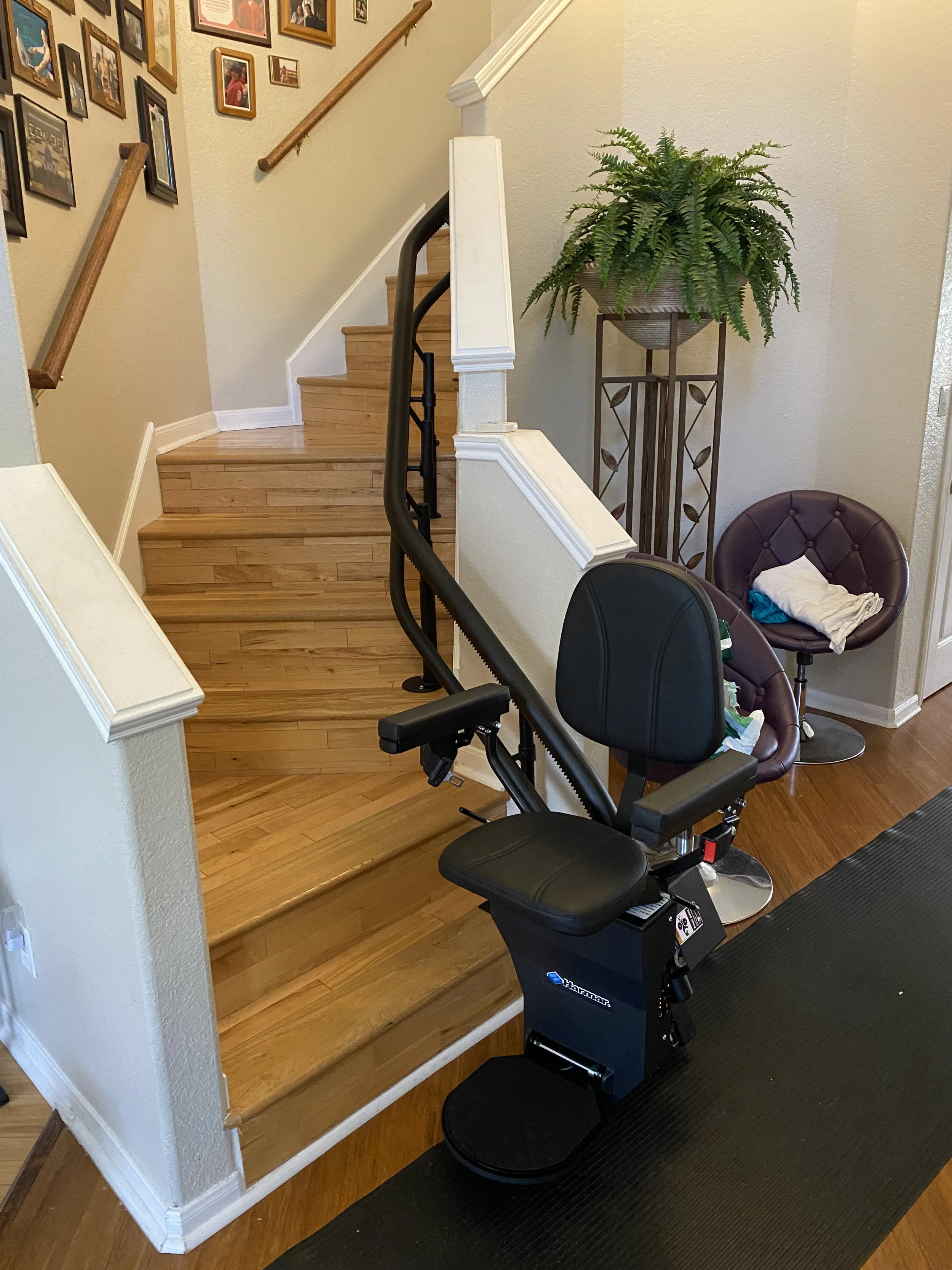 Black Curved Stairlift on Multi-Angle Stairs